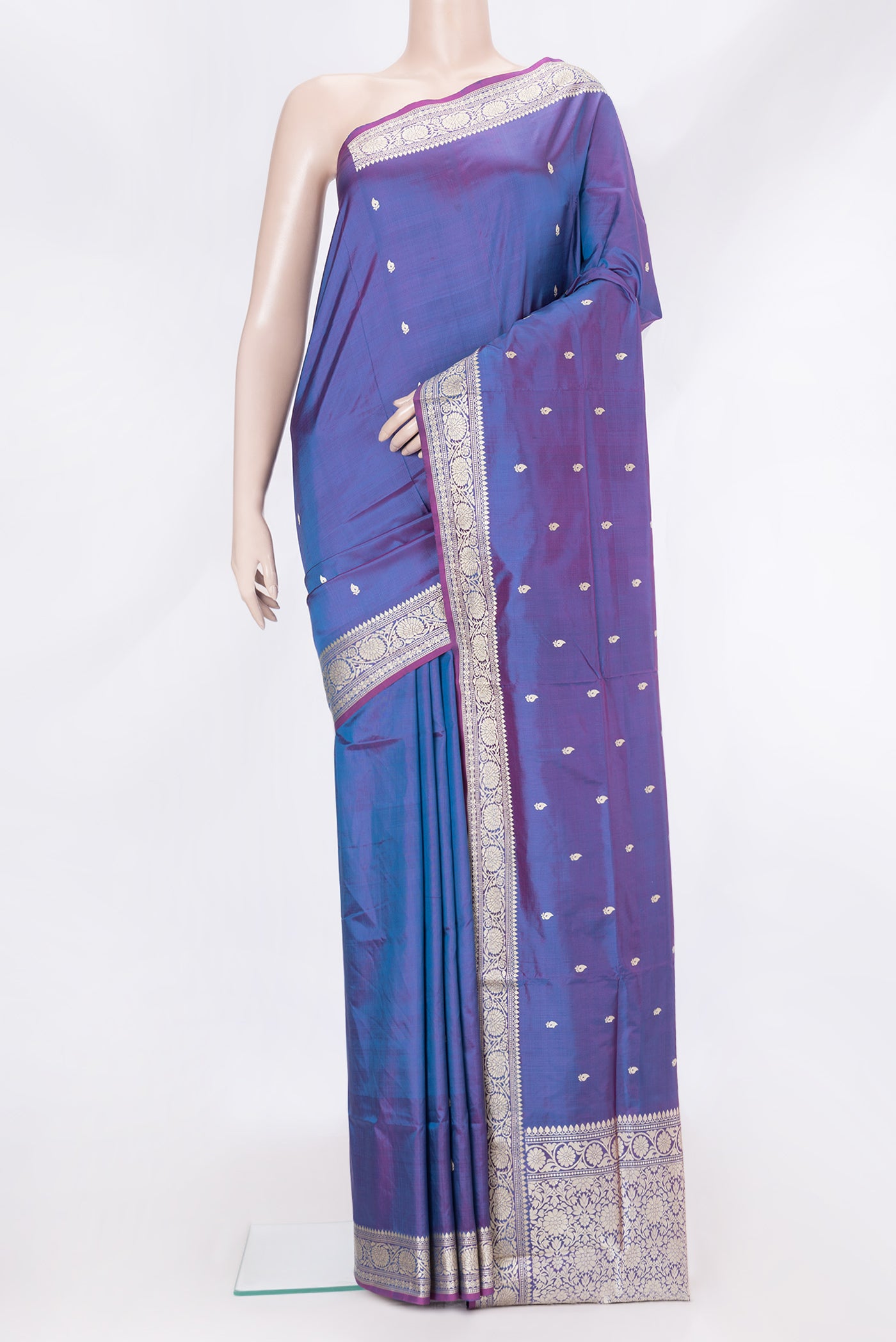 Peacock Blue Dual Tone Banarasi Silk Saree with Thread Butta on the body and Thread Border.  displayed on a mannequin