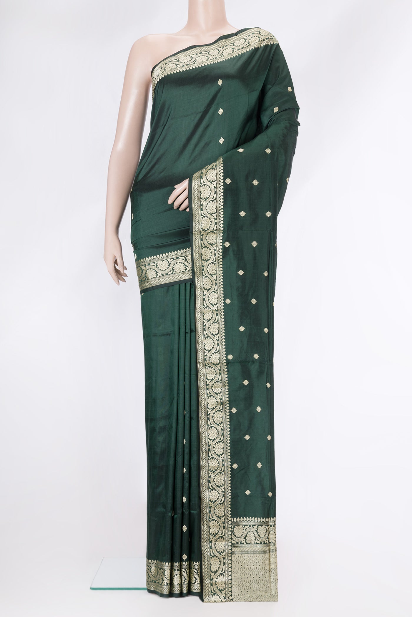 Bottle Green Dual Tone Banarasi Silk Saree with Thread Butta on the body and Thread Border.  displayed on a mannequin