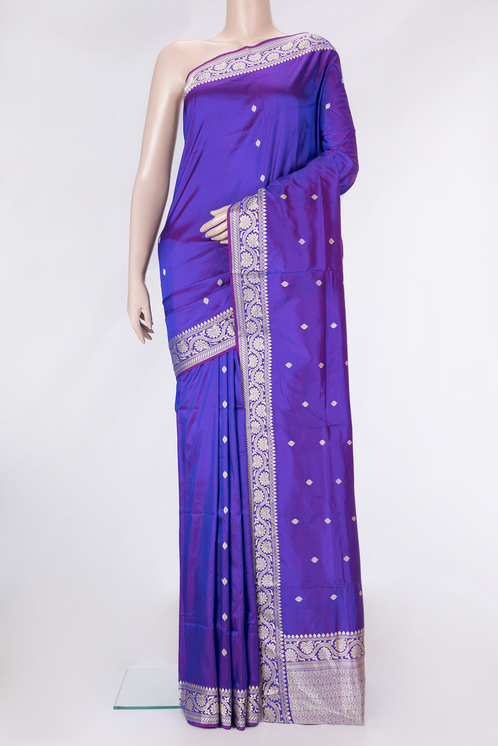 Purple Dual Tone Banarasi Silk Saree with Thread Butta on the body and Thread Border.  displayed on a mannequin