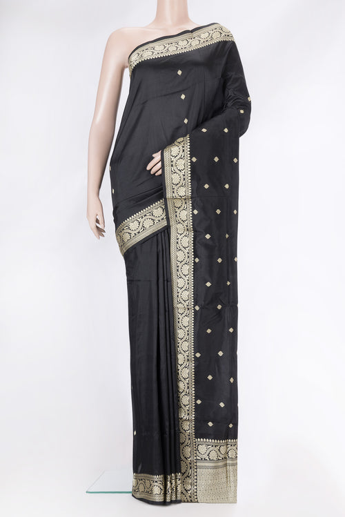 Black Dual Tone Banarasi Silk Saree with Thread Butta on the body and Thread Border.  displayed on a mannequin