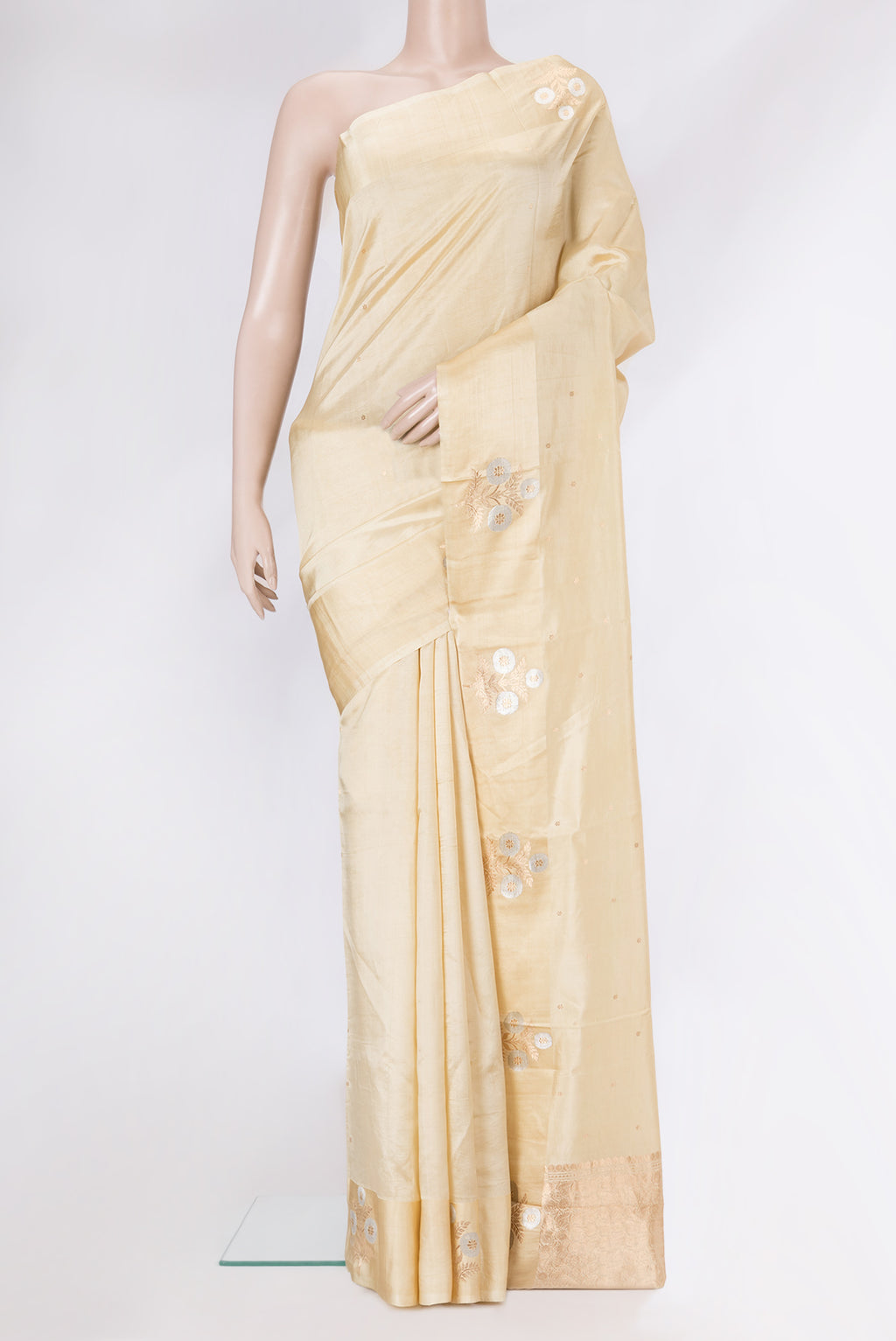 Beige Dual Tone Banarasi Katan Silk Saree with Zari Butta on the body and Fancy Border.  displayed on a mannequin