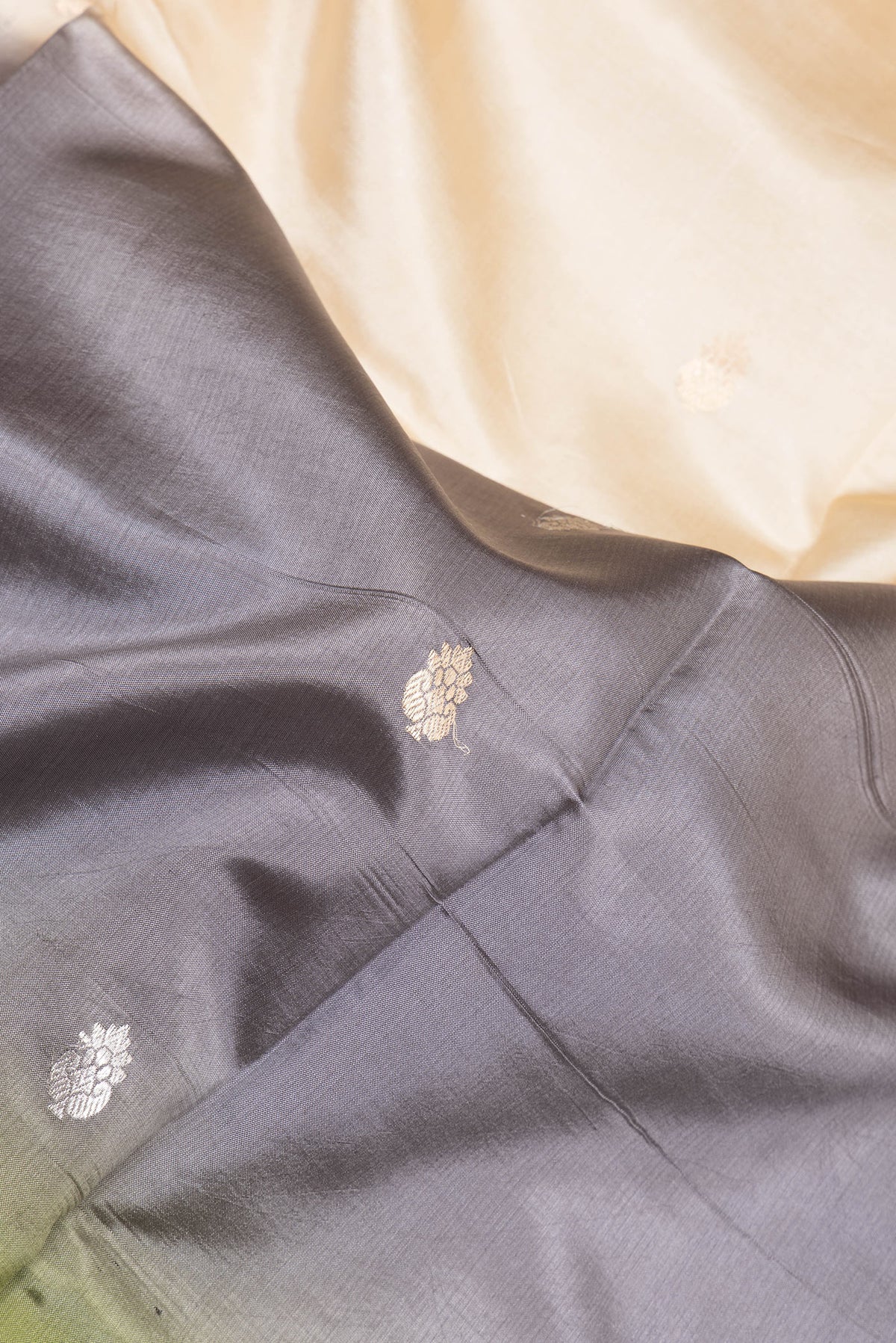Close up of Multi Color Tussar Silk Saree with Stripes on the body and Plain Border.  displaying folds