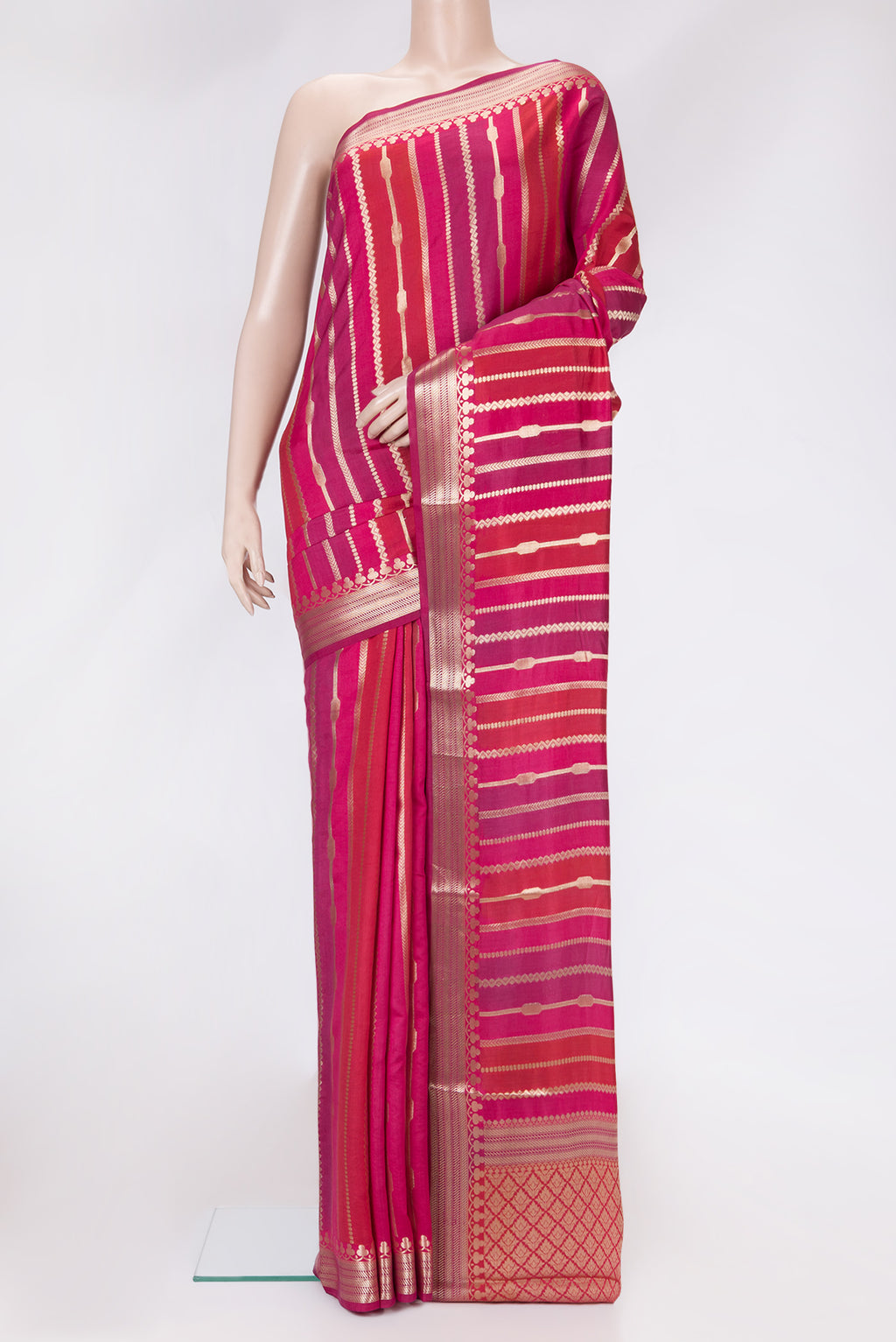 Red,Purple and Pink Color Tussar Silk Saree with Zari Brocade on the body and Zari Border.  displayed on a mannequin