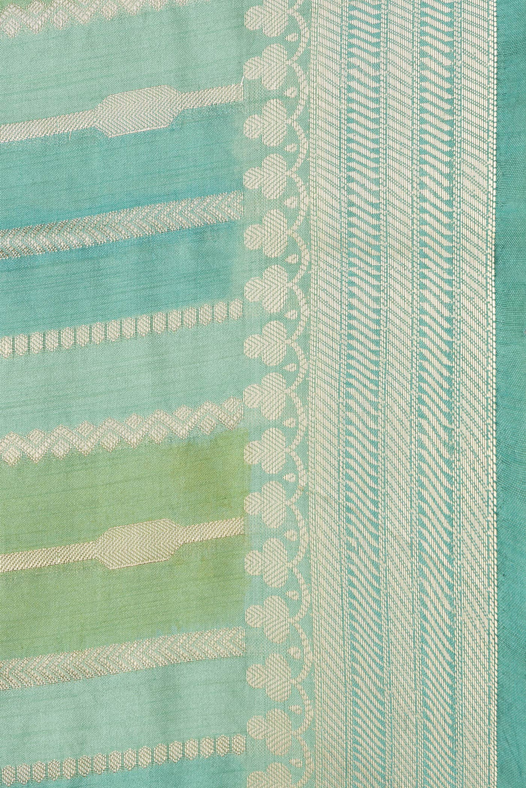 Border image of Pista Green Dual Tone Tussar Silk Saree with Stripes on the body and Zari Border. 