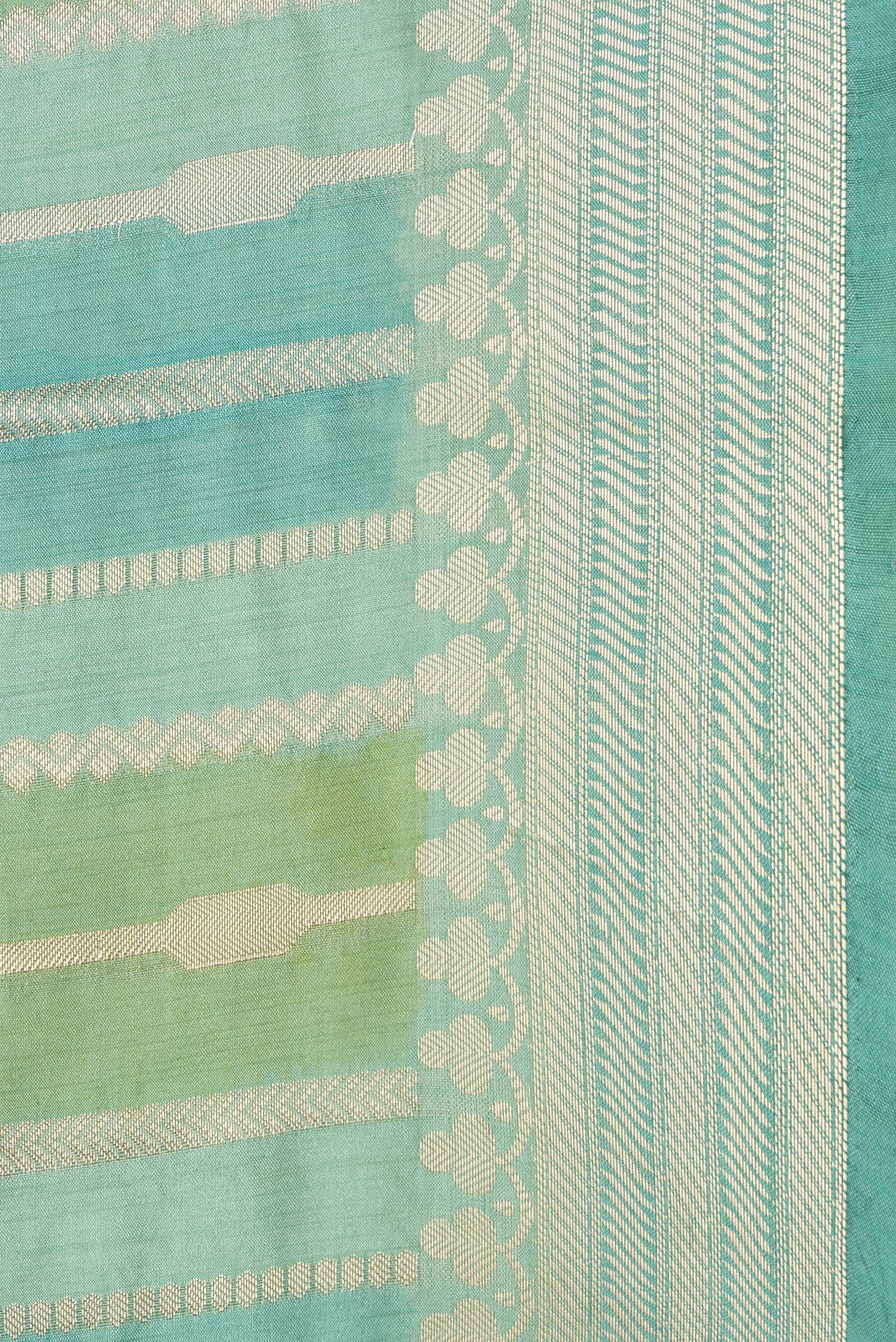 Border image of Pista Green Dual Tone Tussar Silk Saree with Stripes on the body and Zari Border. 