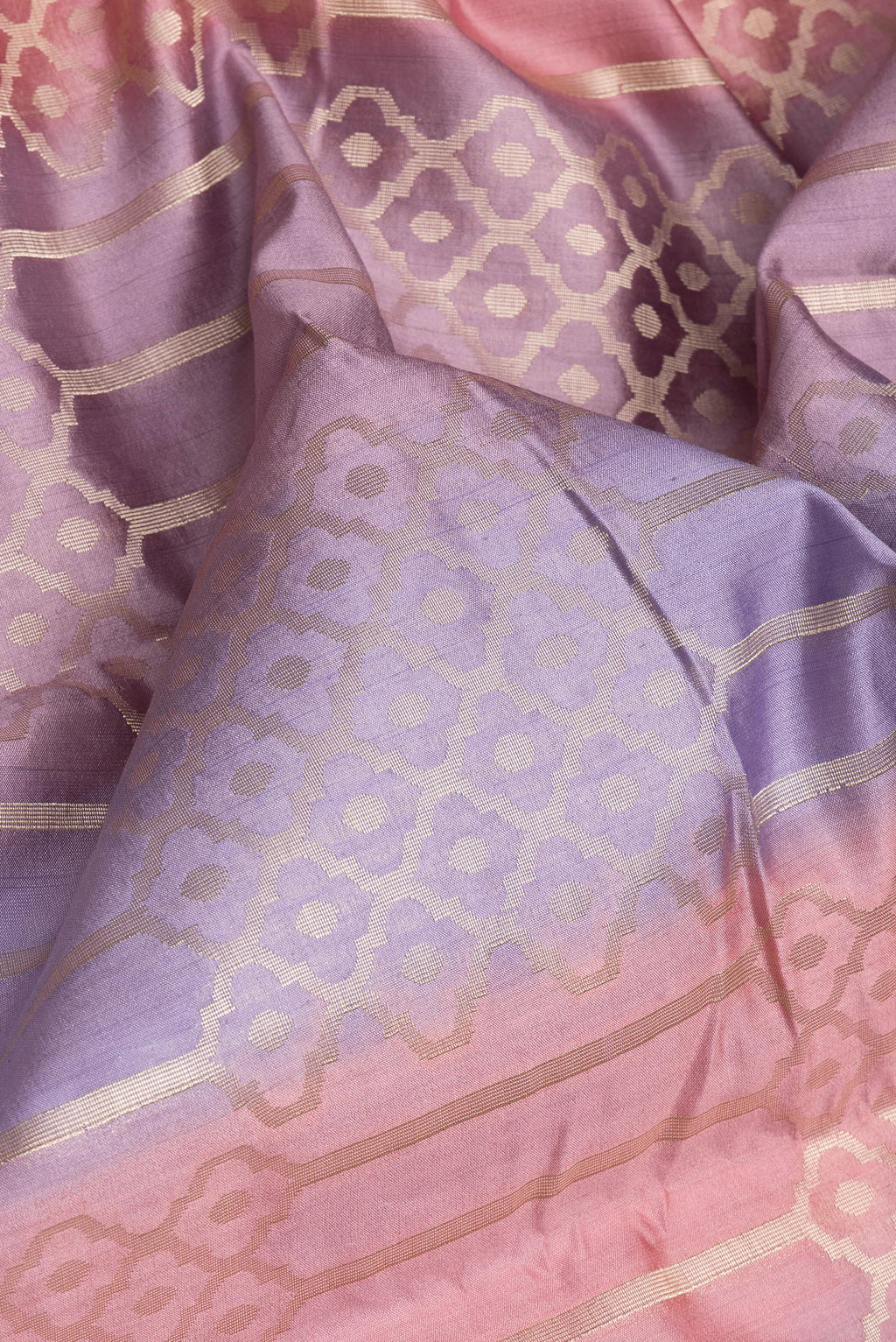 Close up of Multi Color Tussar Silk Saree with Zari Brocade on the body and Zari Border.  displaying folds