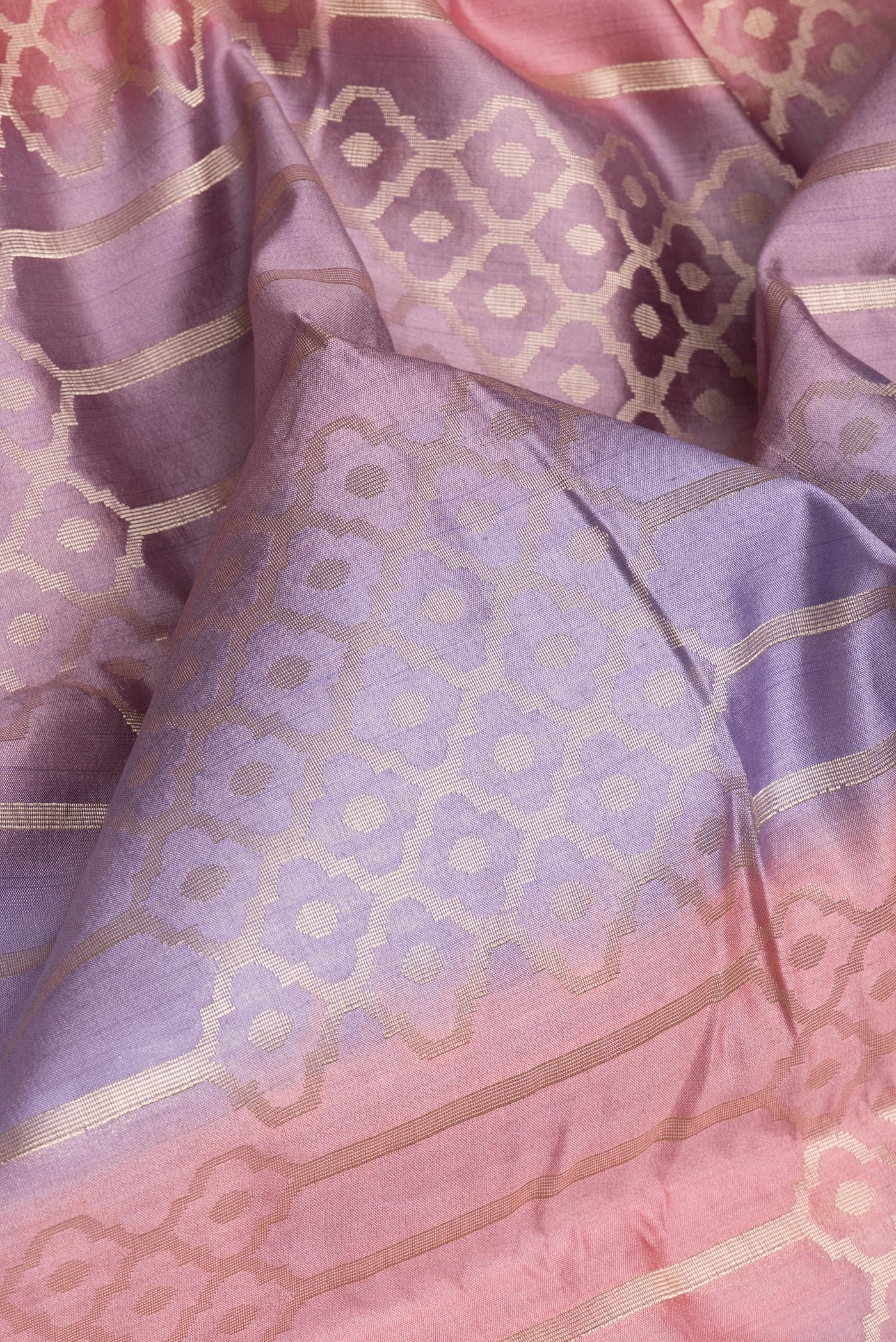 Close up of Multi Color Tussar Silk Saree with Zari Brocade on the body and Zari Border.  displaying folds