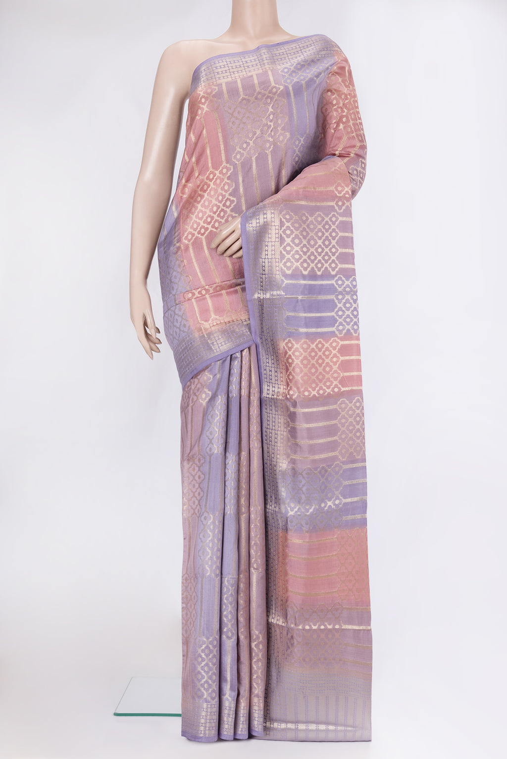Multi Color Tussar Silk Saree with Zari Brocade on the body and Zari Border.  displayed on a mannequin