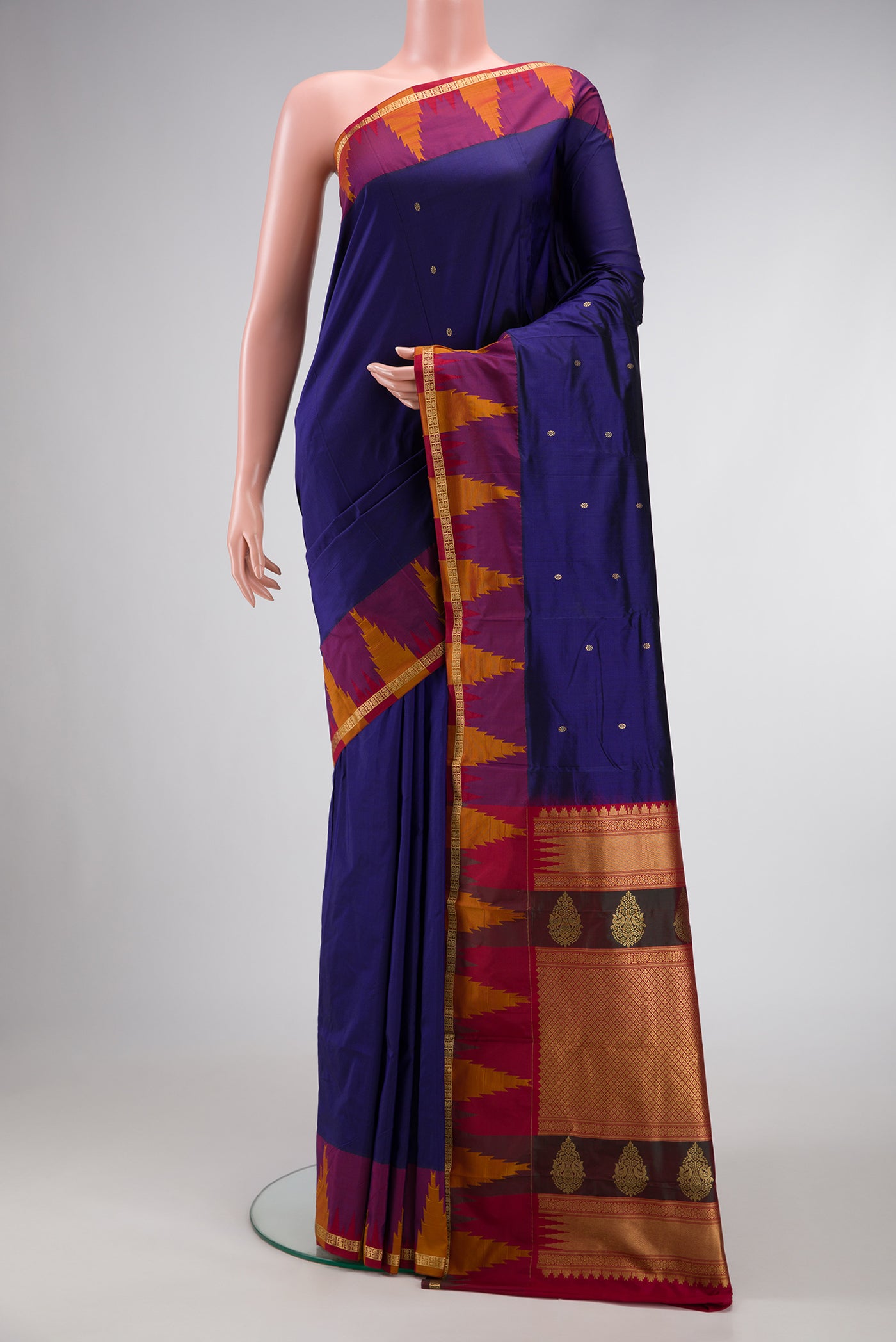 Violet Dual Tone Kanchipuram Silk Saree with Zari Butta on the body and Zari Border.  displayed on a mannequin