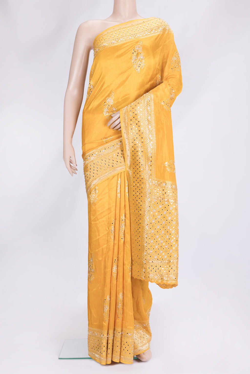 Yellow Dual Tone Mysore Georgette Saree with Embroidery on the body and Embroidery Border.  displayed on a mannequin