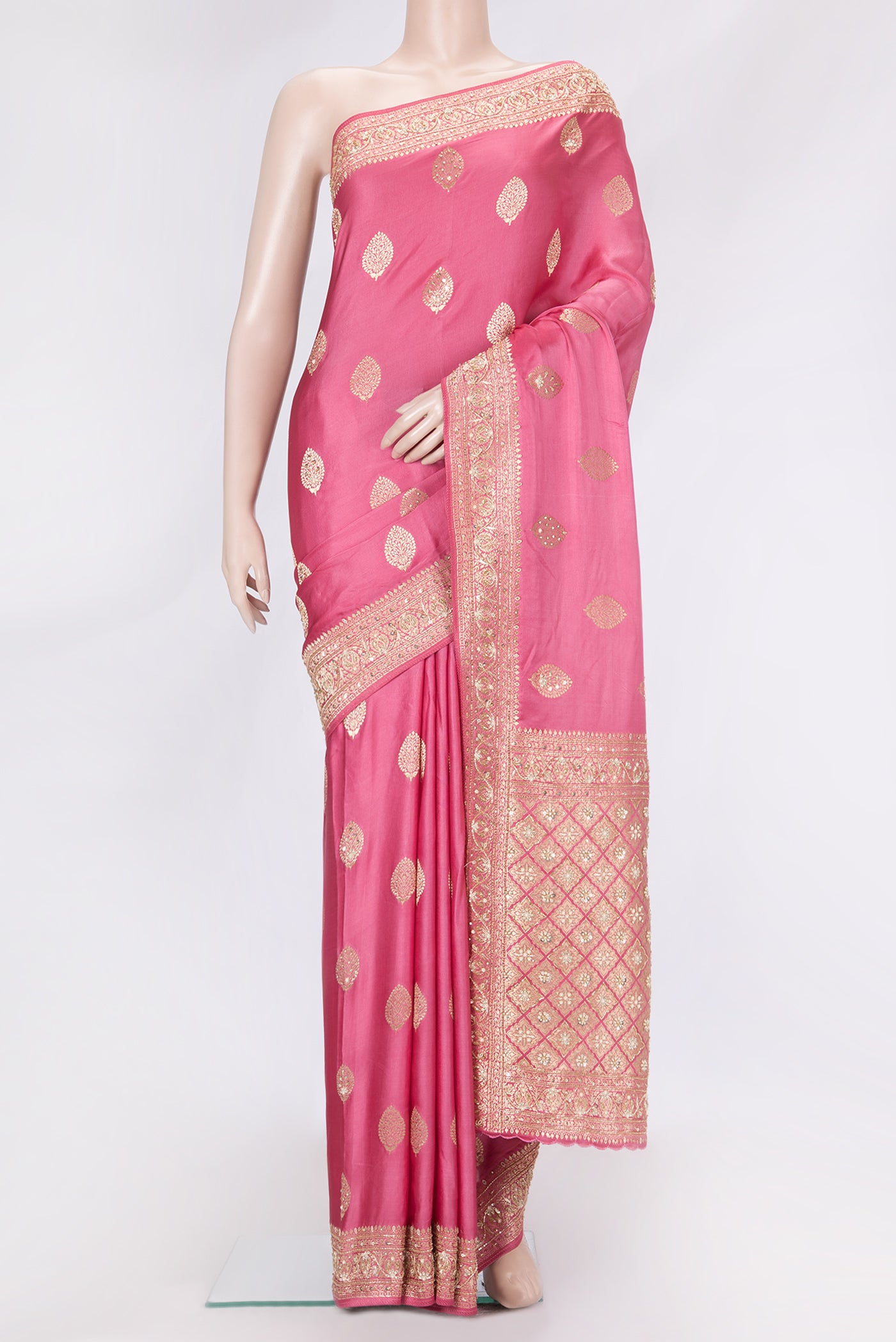 Pink Dual Tone Satin Crepe Saree with Embroidery on the body and Embroidery Border.  displayed on a mannequin