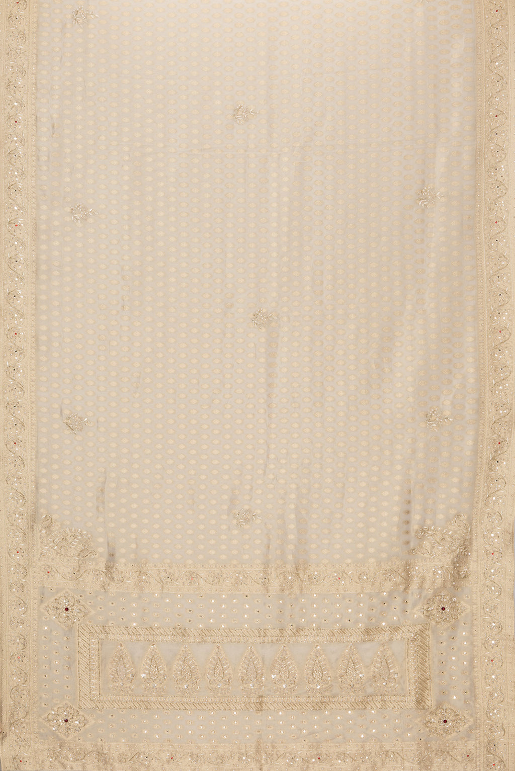 Flat view of Beige Dual Tone Organza Silk Saree with Zari Brocade on the body and Embroidery Border. 