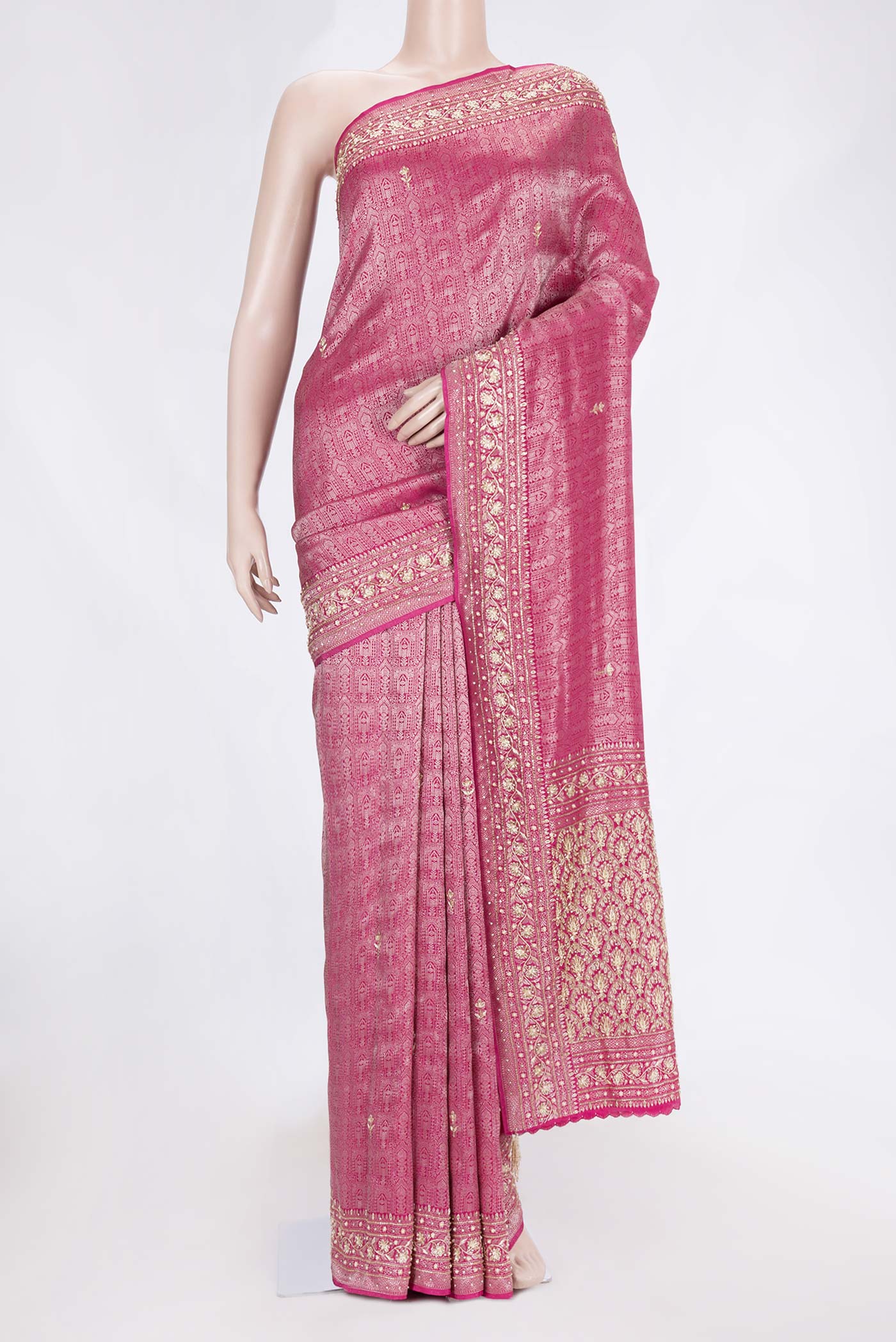 Pink Dual Tone Mysore Crepe Saree with Zari Brocade on the body and Embroidery Border.  displayed on a mannequin