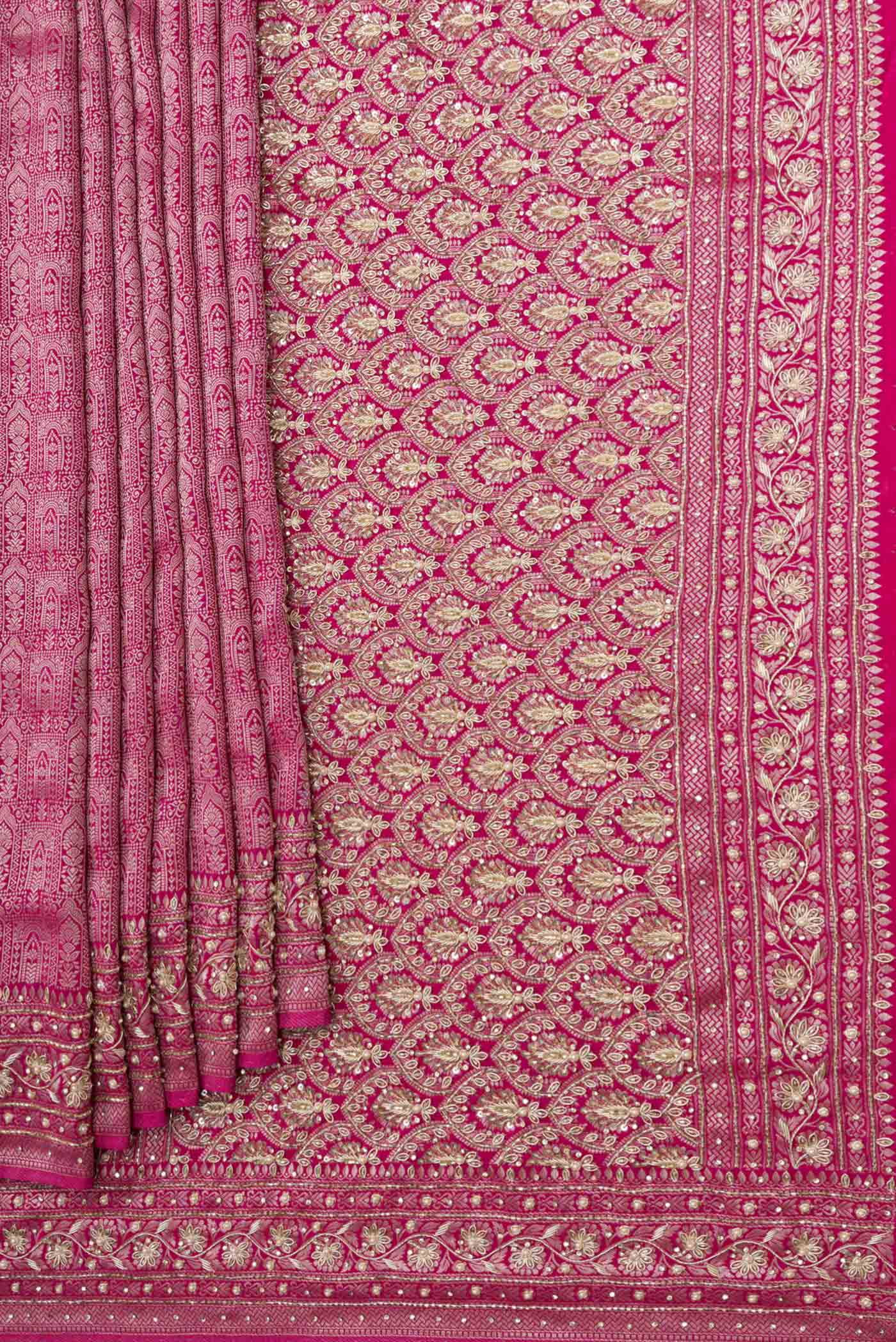Pleats and pallu of Pink Dual Tone Mysore Crepe Saree with Zari Brocade on the body and Embroidery Border. 
