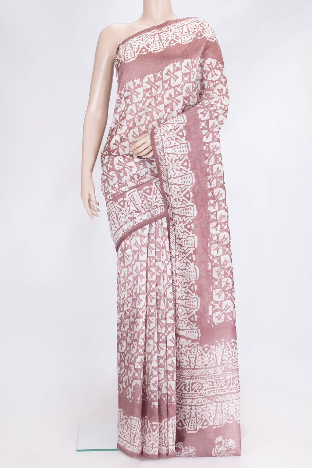 Brown Dual Tone Tussar Silk Saree with Printed design on the body and Printed Border.  displayed on a mannequin