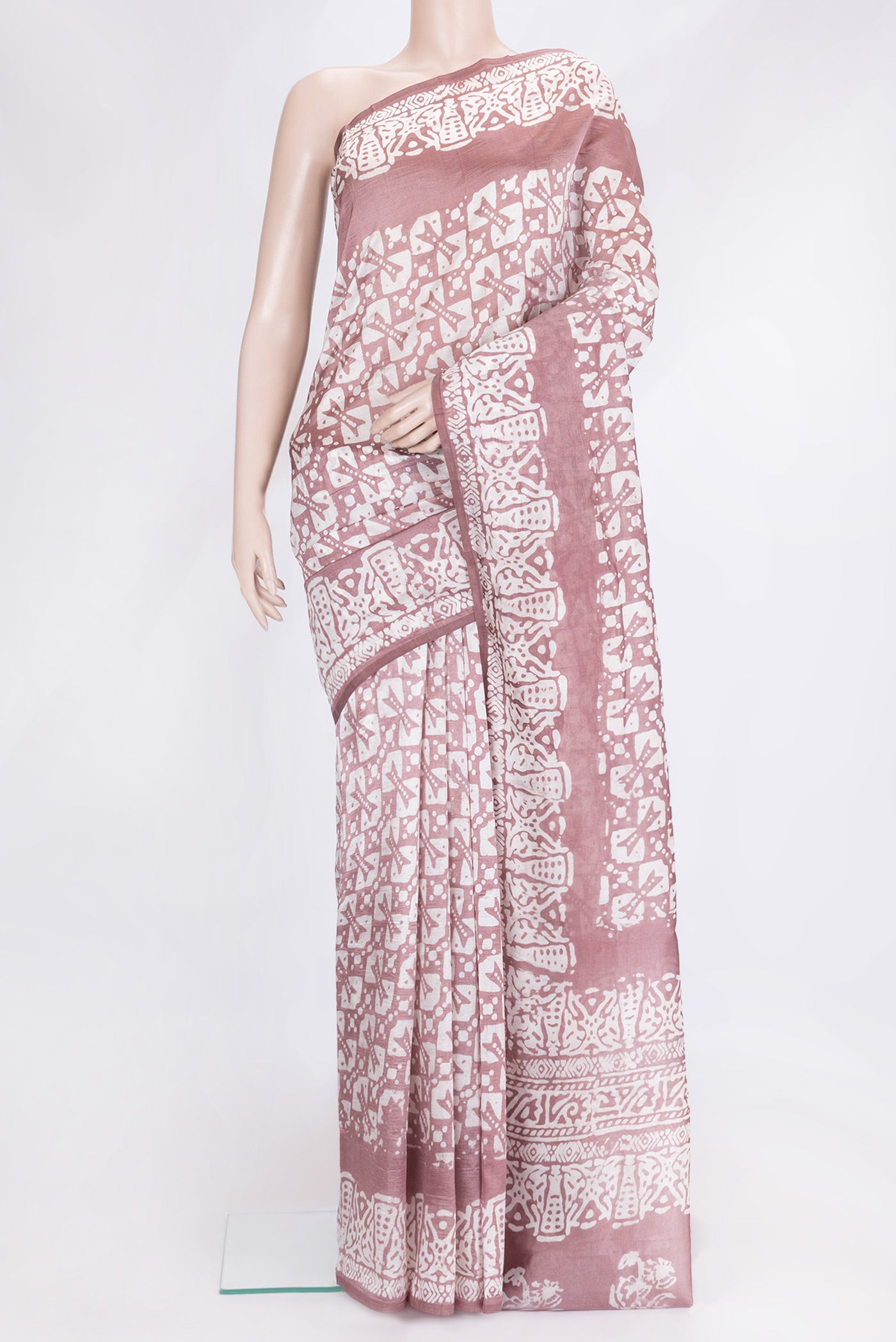 Brown Dual Tone Tussar Silk Saree with Printed design on the body and Printed Border.  displayed on a mannequin