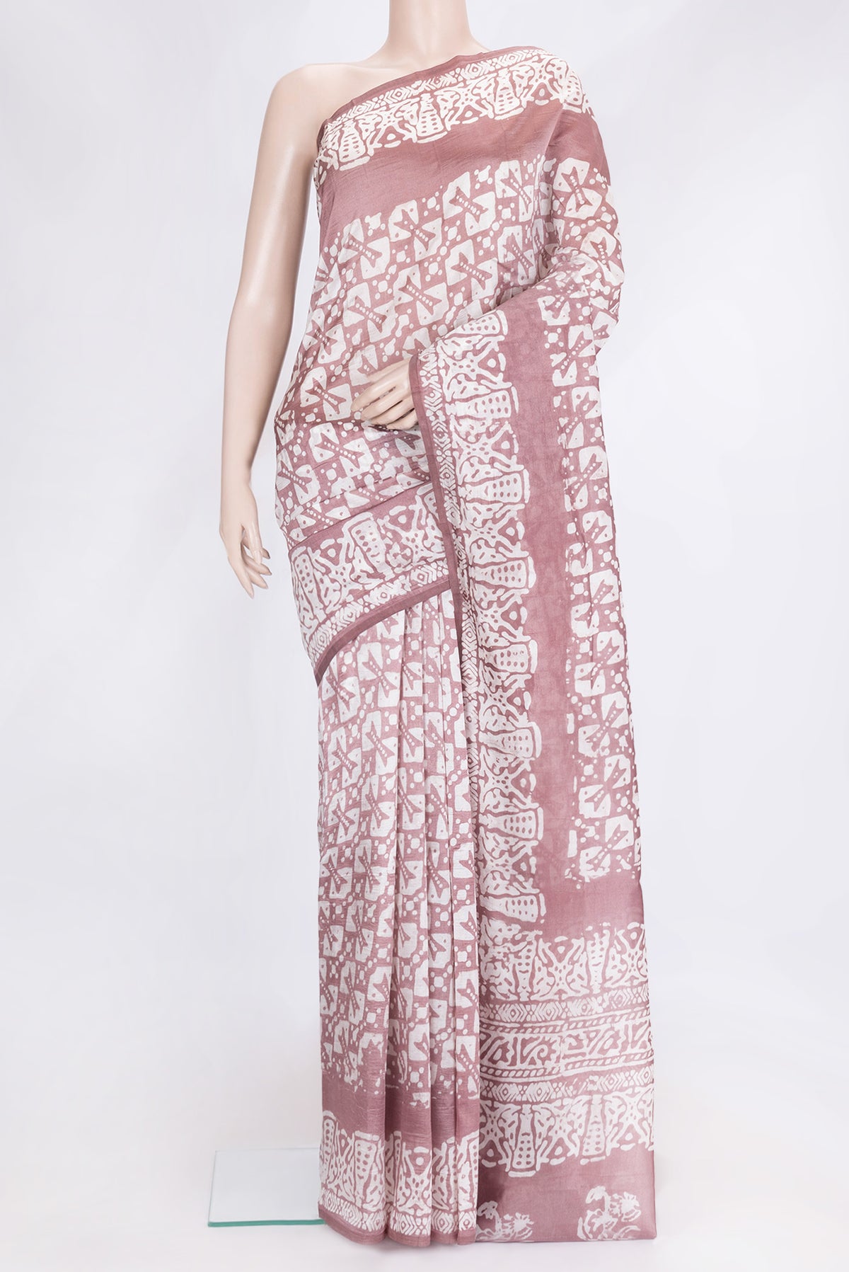 Brown Dual Tone Tussar Silk Saree with Printed design on the body and Printed Border.  displayed on a mannequin
