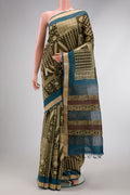 Mehandi Green Dual Tone Tussar Silk Saree with Printed design on the body and Zari Border.  displayed on a mannequin