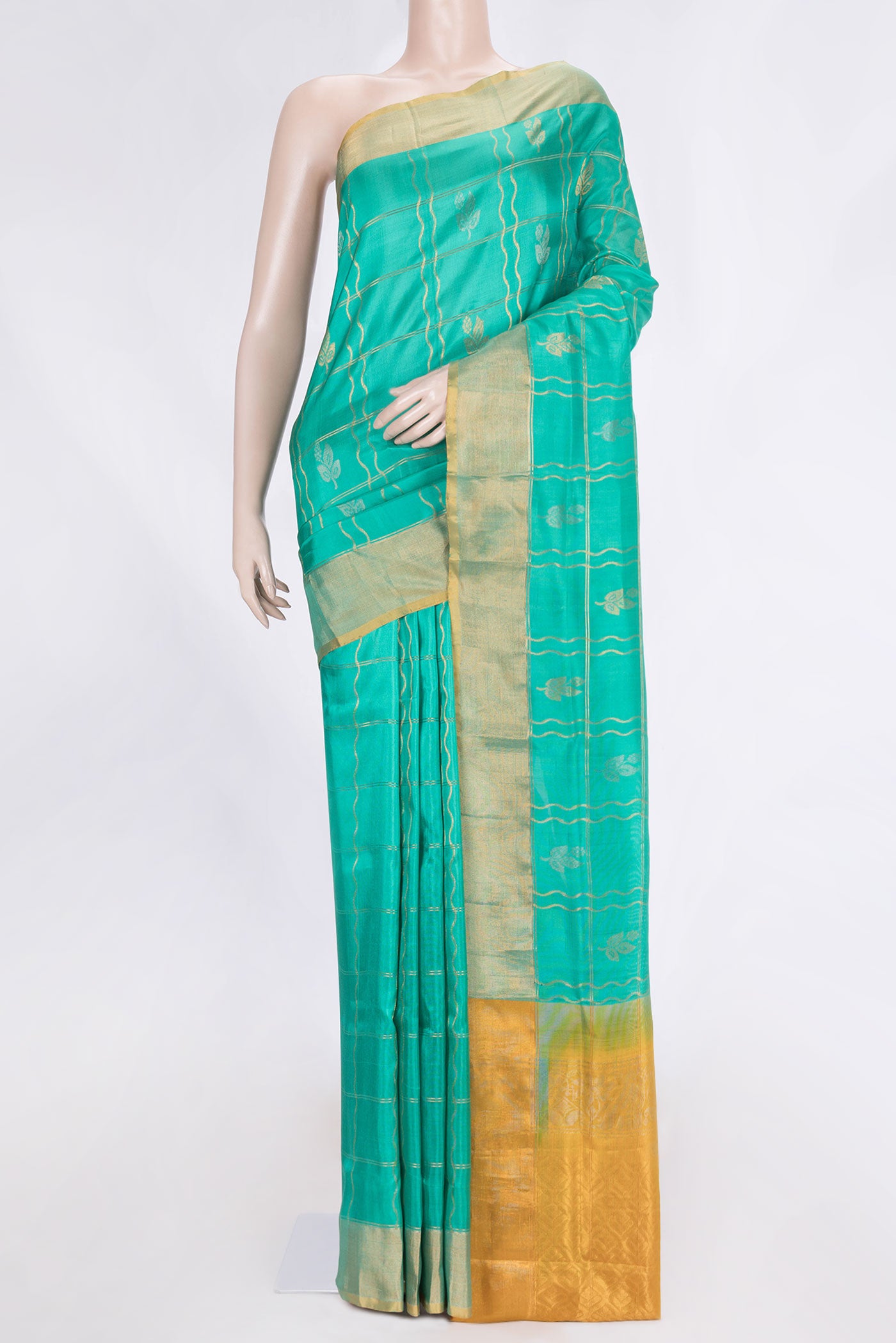 Sea Green Dual Tone Uppada Silk Saree with Checked design on the body and Zari Border.  displayed on a mannequin