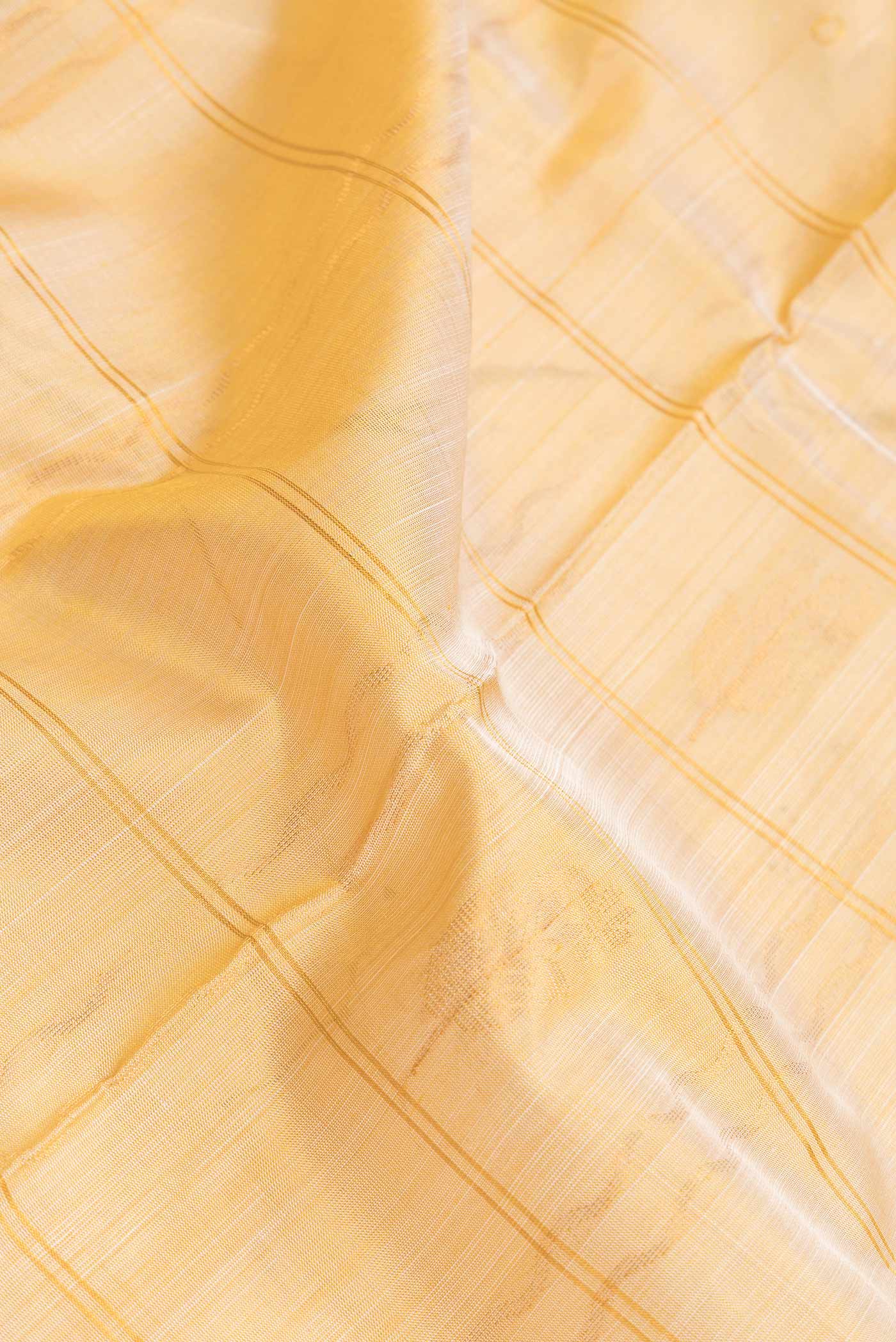 Close up of Sandal Dual Tone Uppada Silk Saree with Checked design on the body and Zari Border.  displaying folds