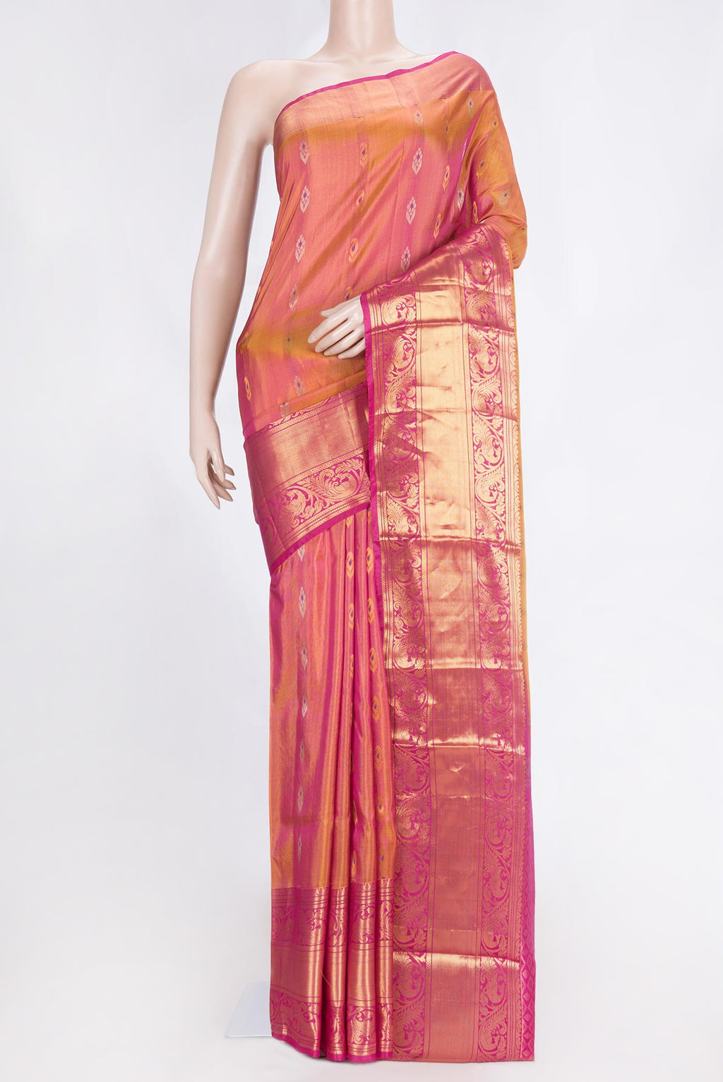 Mustard Dual Tone Uppada Silk Saree with Zari And Thread Butta on the body and Zari Border.  displayed on a mannequin