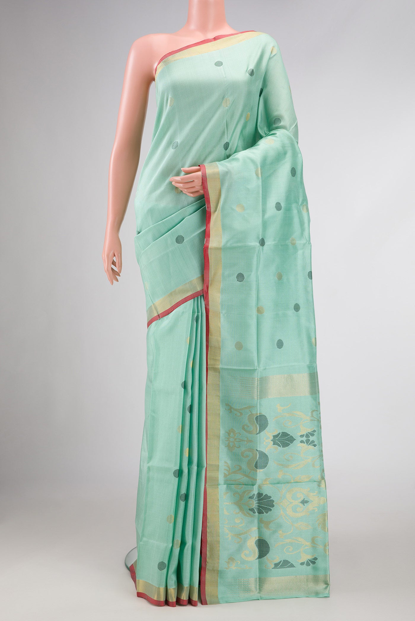 Light Green Dual Tone Uppada Silk Saree with Zari And Thread Butta on the body and Fancy Border.  displayed on a mannequin