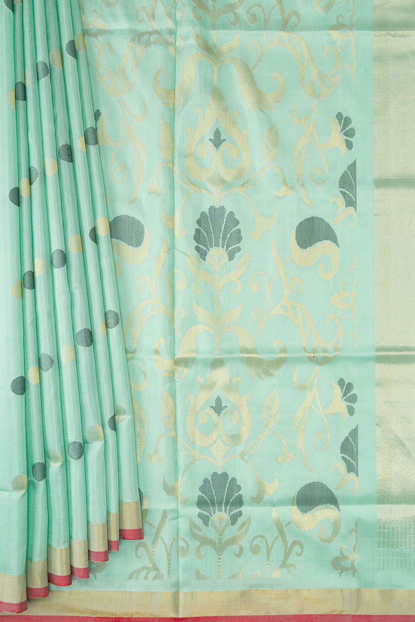 Pleats and pallu of Light Green Dual Tone Uppada Silk Saree with Zari And Thread Butta on the body and Fancy Border. 