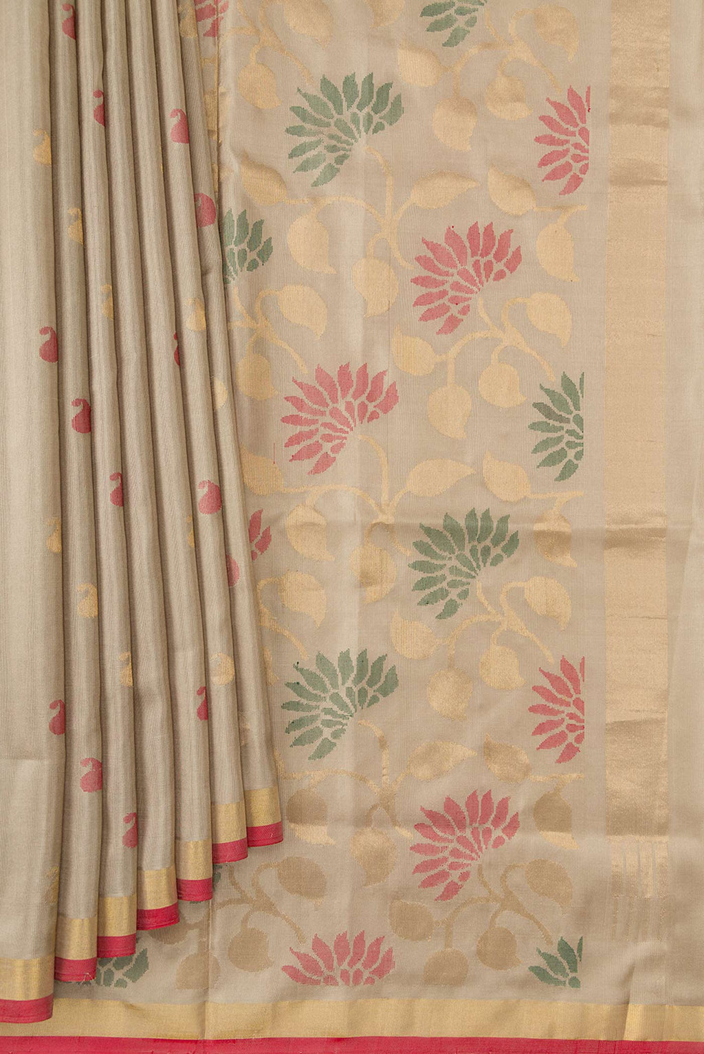 Pleats and pallu of Beige Dual Tone Uppada Silk Saree with Zari And Thread Butta on the body and Zari Border. 