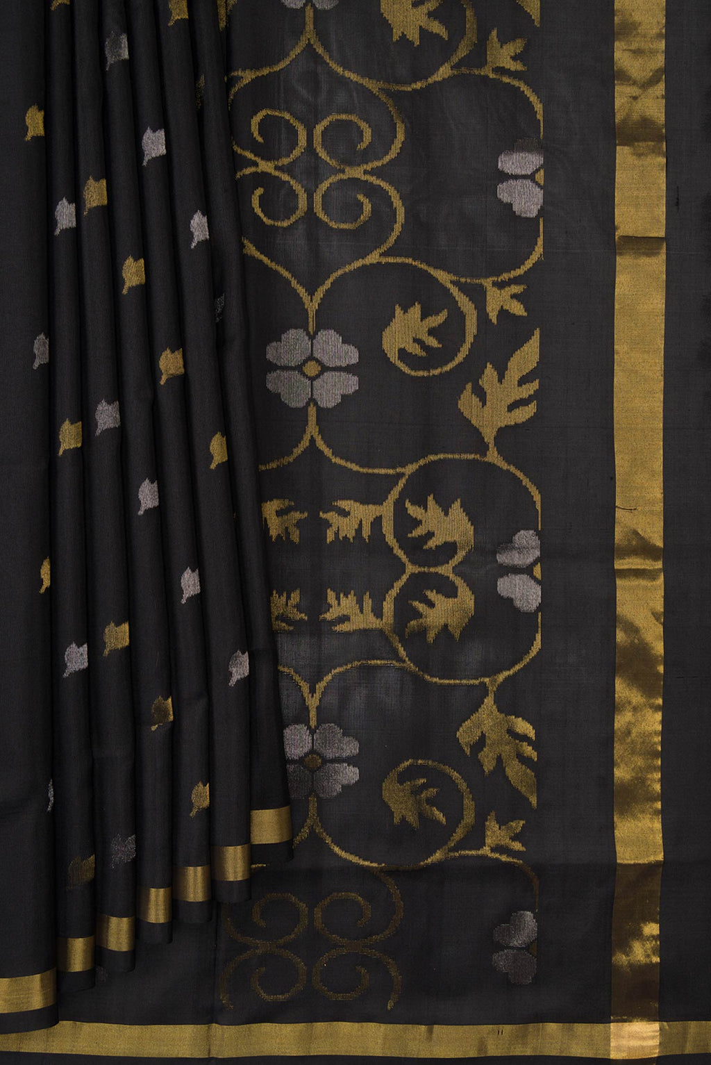 Pleats and pallu of Black Dual Tone Uppada Silk Saree with Zari Butta on the body and Zari Border. 