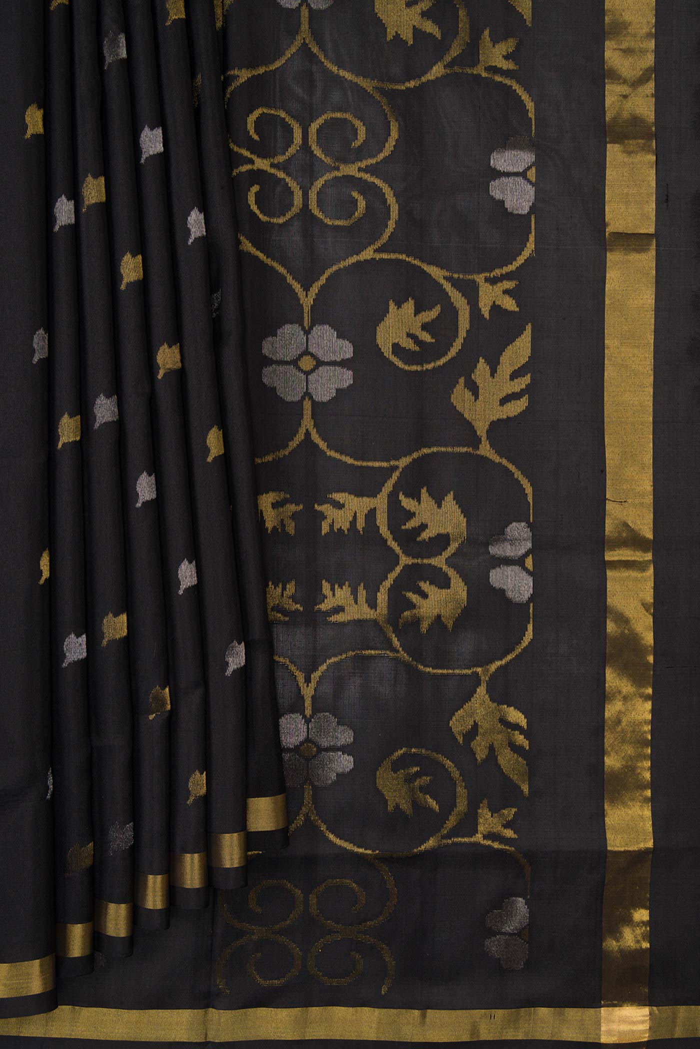 Pleats and pallu of Black Dual Tone Uppada Silk Saree with Zari Butta on the body and Zari Border. 