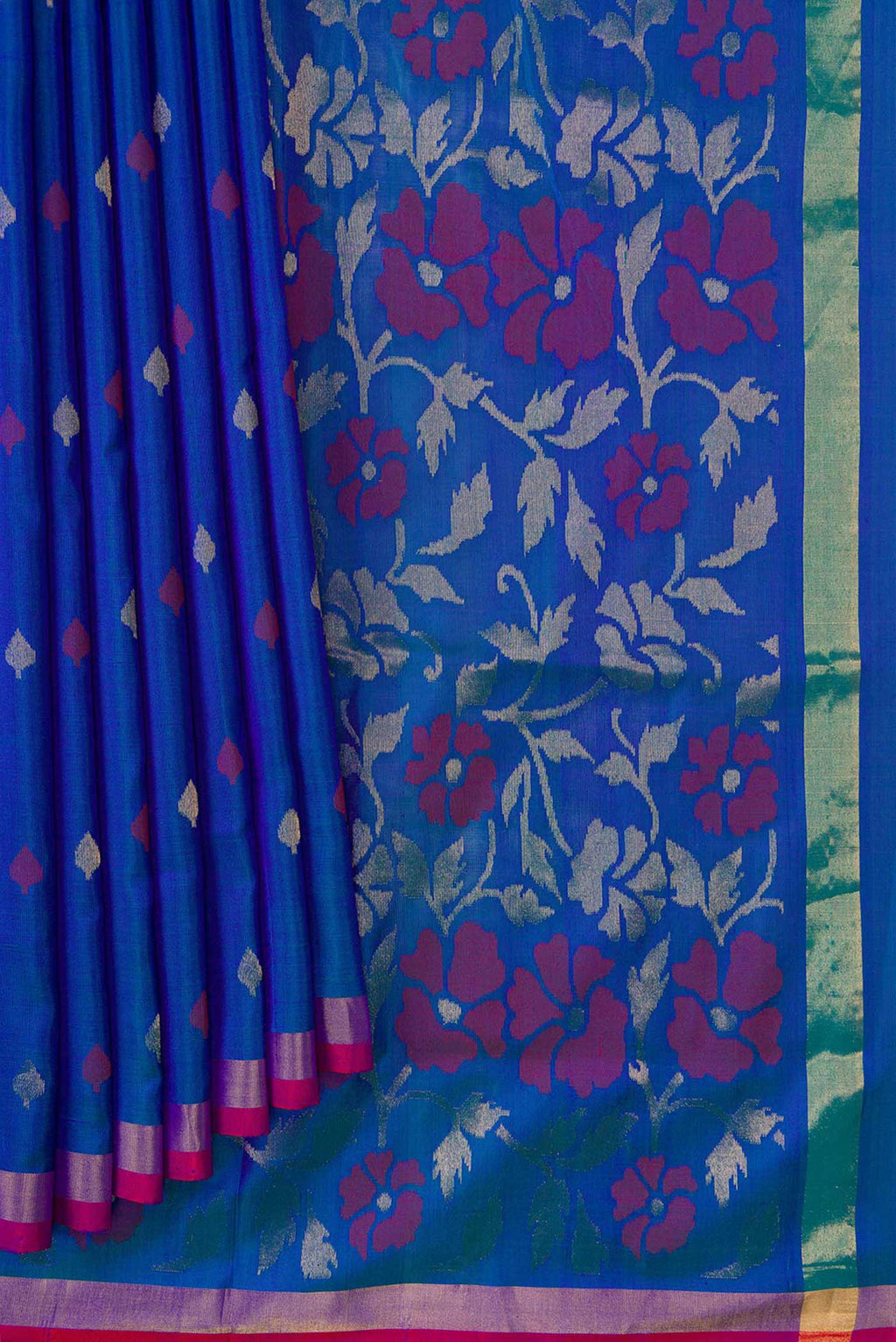 Pleats and pallu of Peacock Blue Dual Tone Uppada Silk Saree with Zari And Thread Butta on the body and Zari Border. 