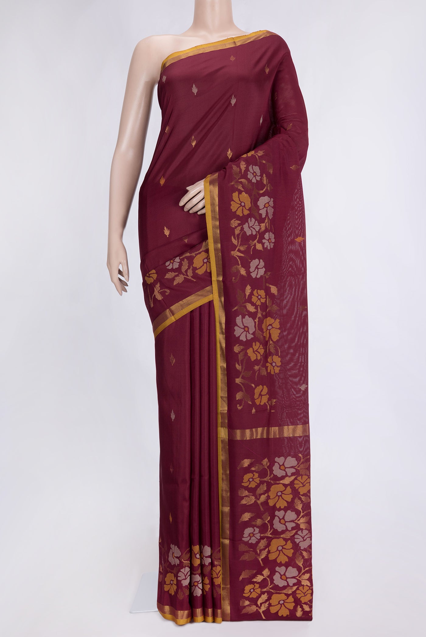Maroon Dual Tone Uppada Silk Saree with Zari Butta on the body and Zari Border.  displayed on a mannequin