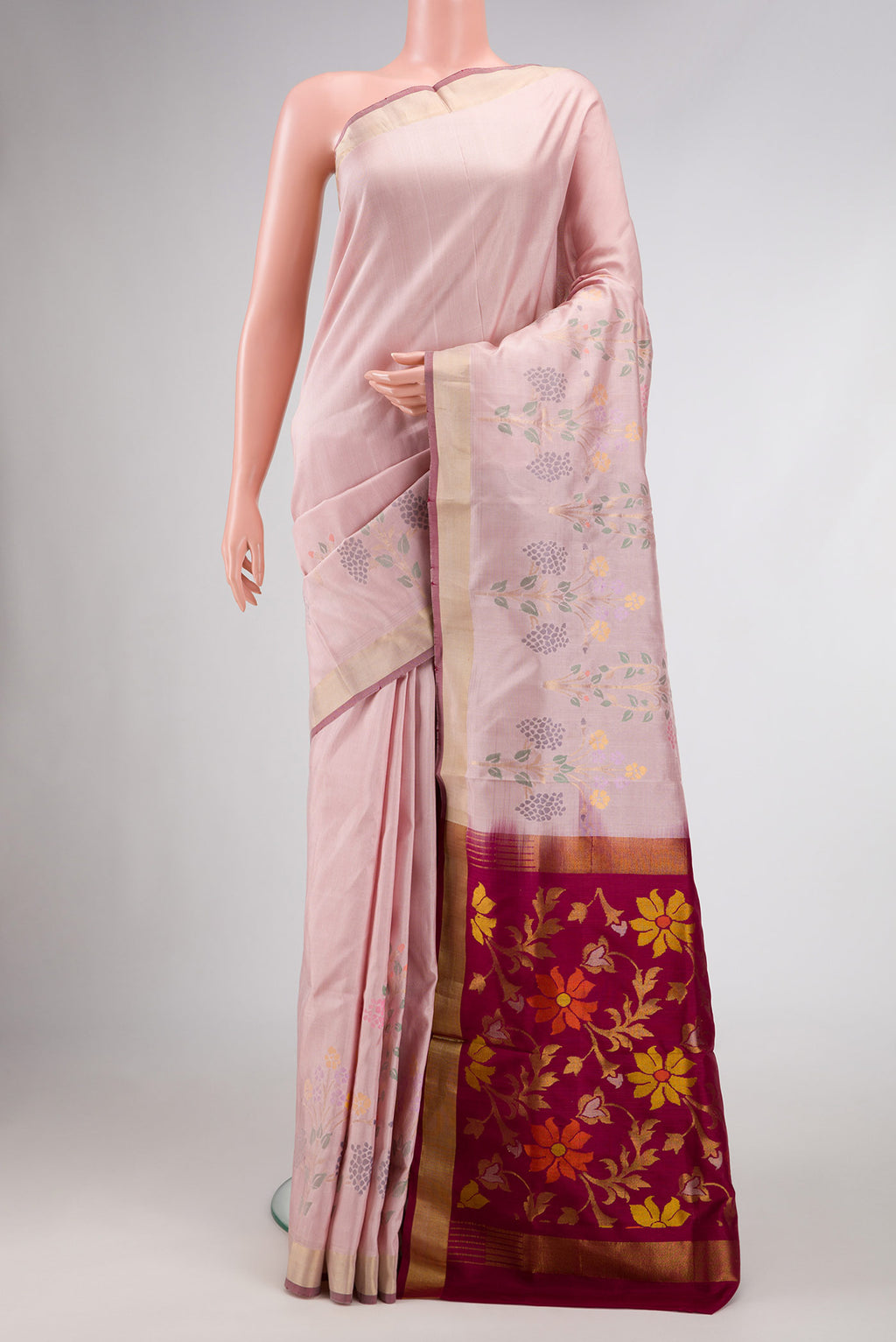 Pink Dual Tone Uppada Silk Saree with Zari Butta on the body and Fancy Border.  displayed on a mannequin