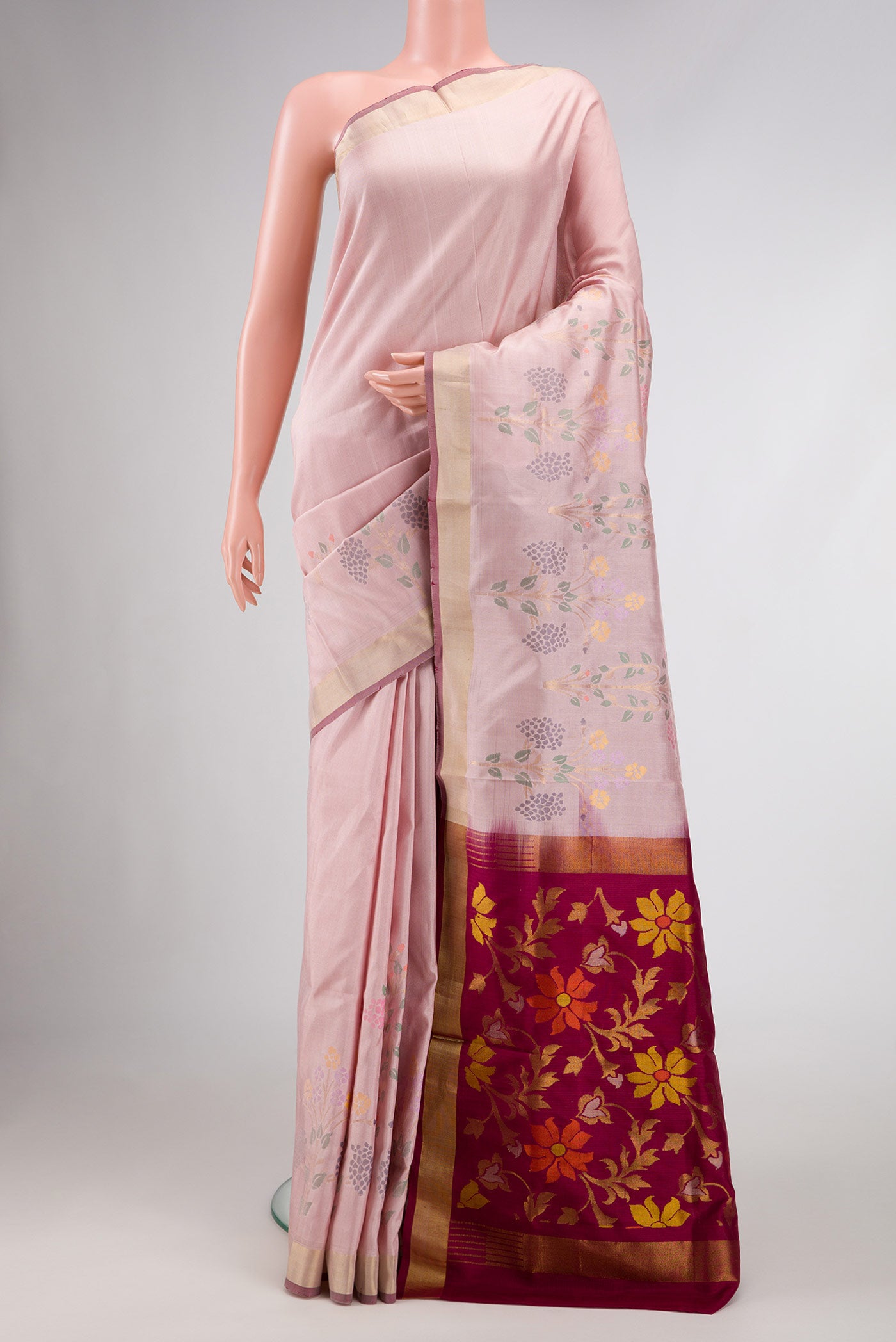 Pink Dual Tone Uppada Silk Saree with Zari Butta on the body and Fancy Border.  displayed on a mannequin