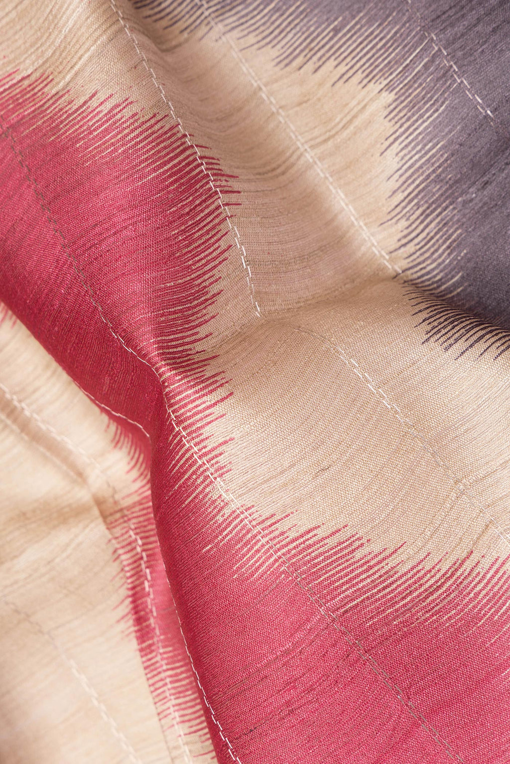 Close up of Pure Silk Beige Dual Tone Tussar Saree with Stripes on the body and Zari Border.  displaying folds