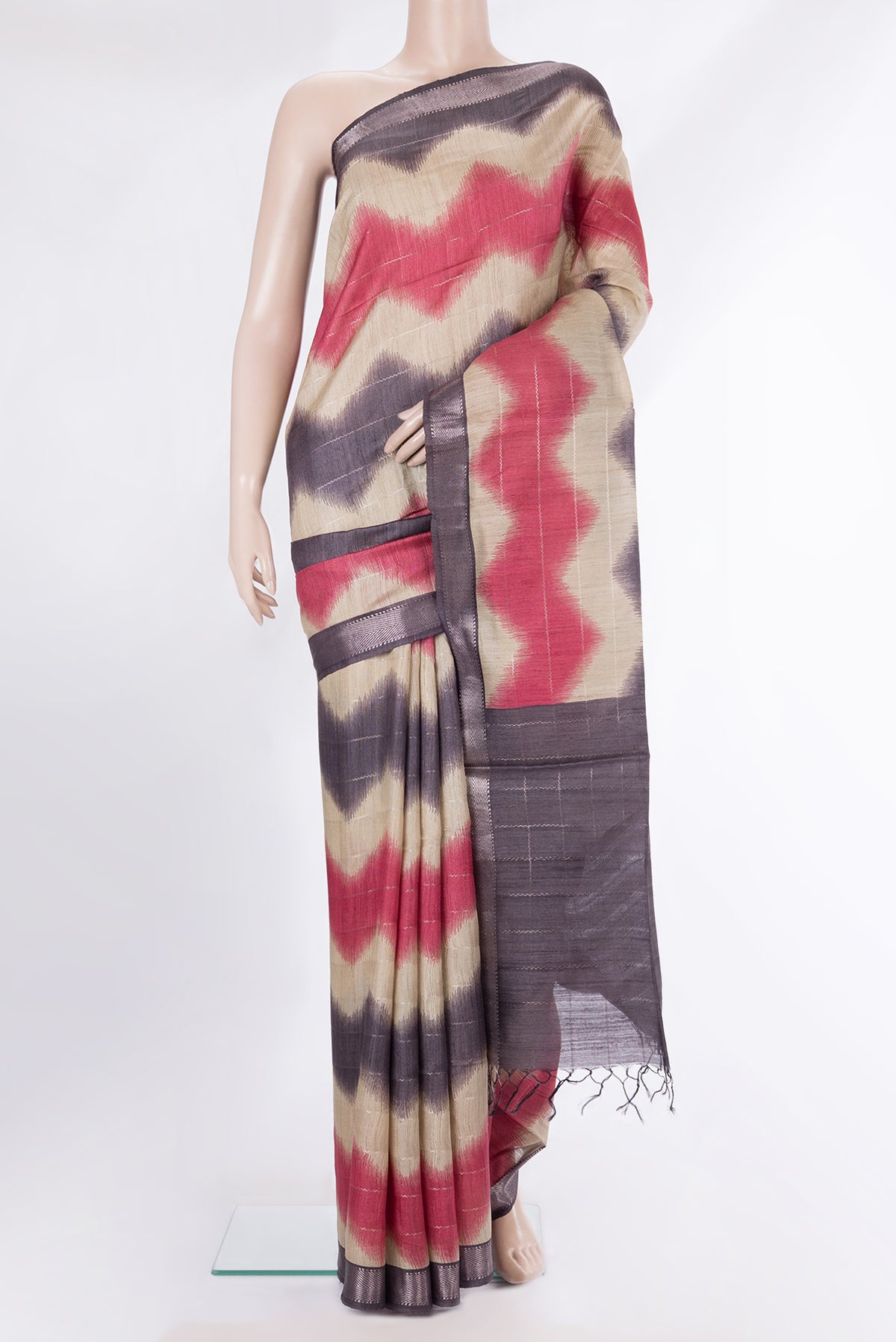 Pure Silk Beige Dual Tone Tussar Saree with Stripes on the body and Zari Border.  displayed on a mannequin