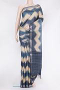 Beige Tussar Silk Saree with Stripes on the body and Zari Border.  displayed on a mannequin