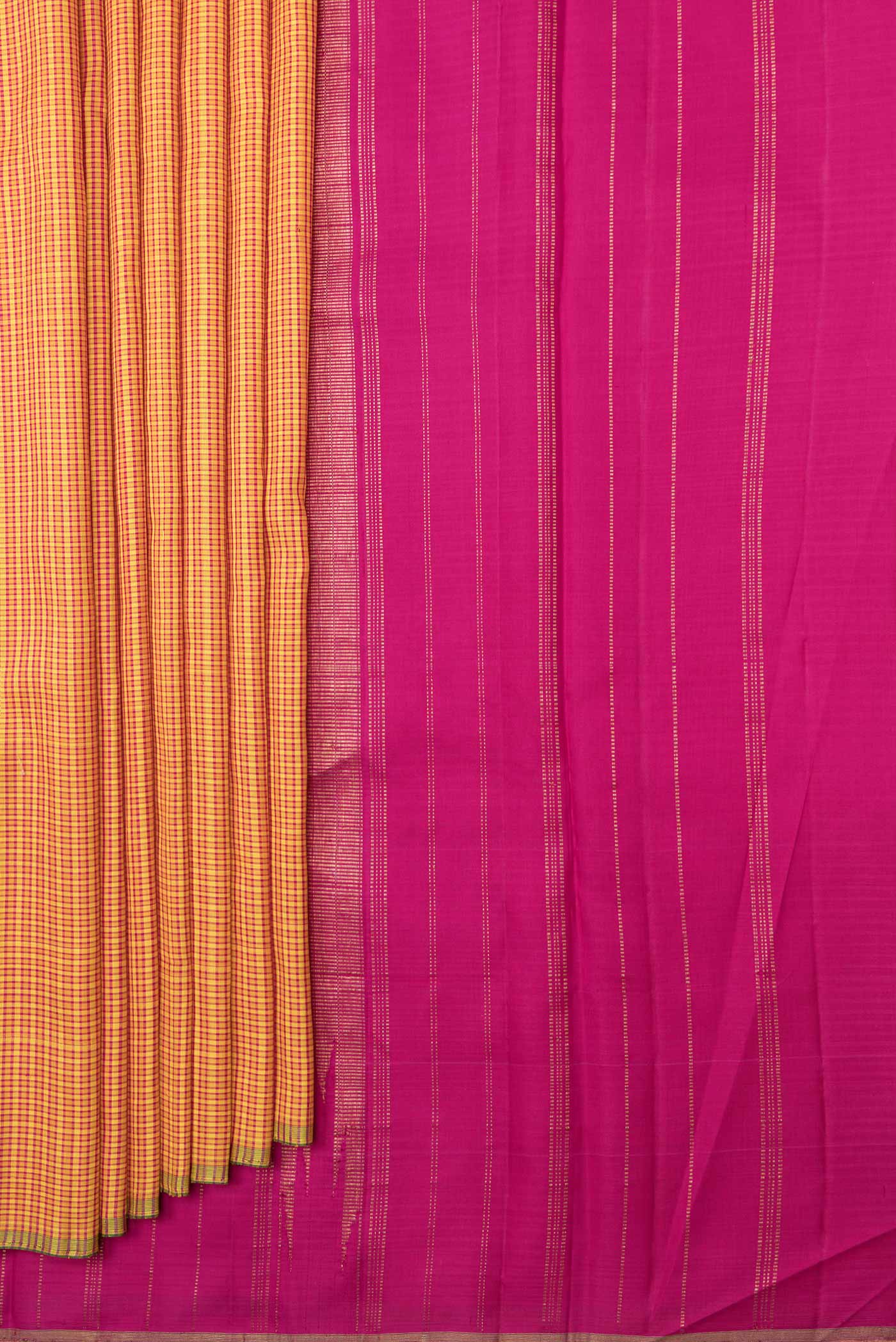 Pleats and pallu of Mustard Dual Tone Kanchipuram Saree with Checked design on the body and Zari Border. 