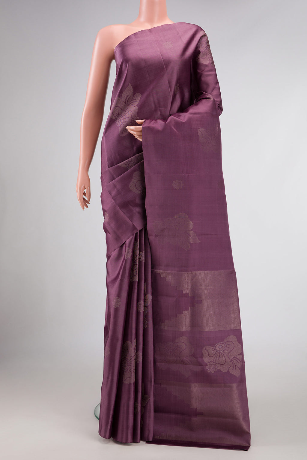 Purple Dual Tone Soft Silk Saree with Zari Butta on the body and Without Border.  displayed on a mannequin