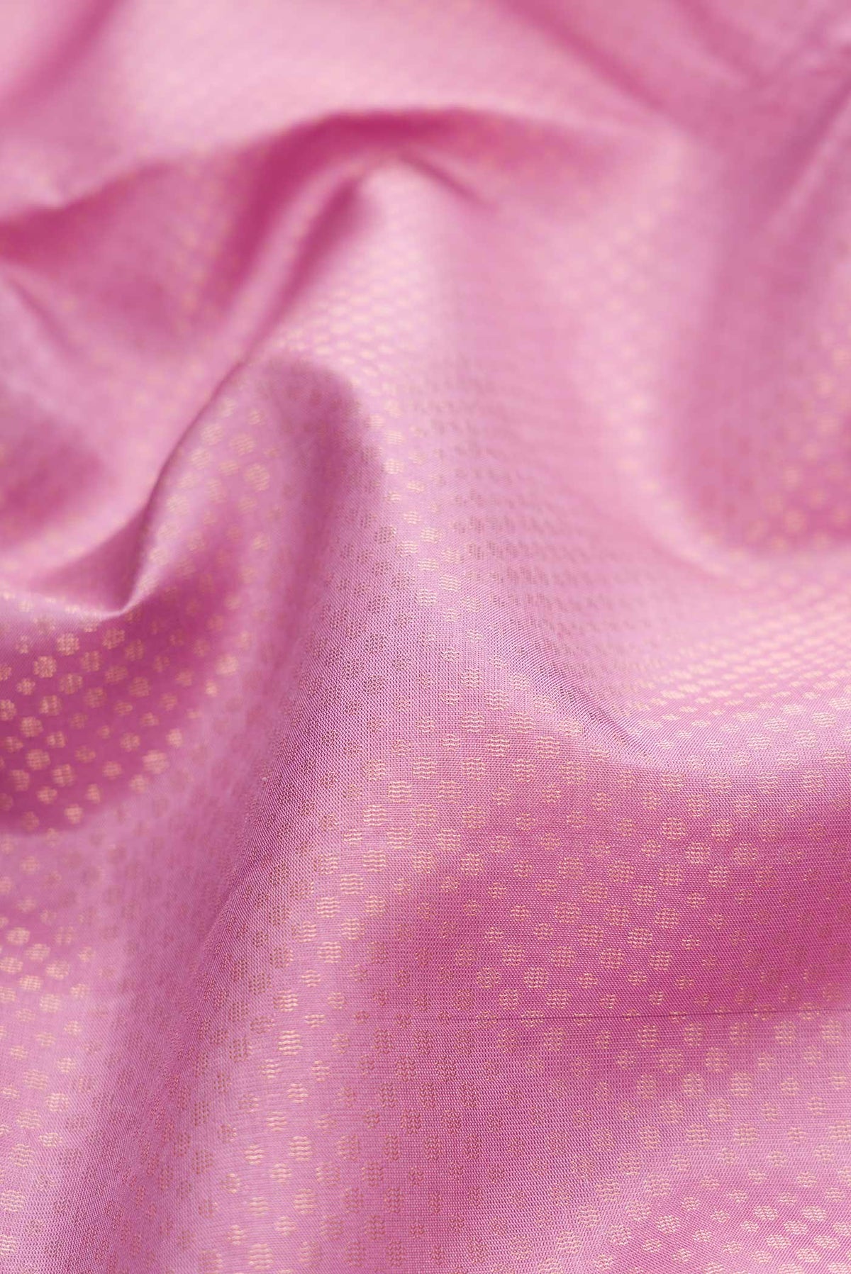 Close up of Lavender Dual Tone Soft Silk Saree with Zari Brocade on the body and Zari Border.  displaying folds