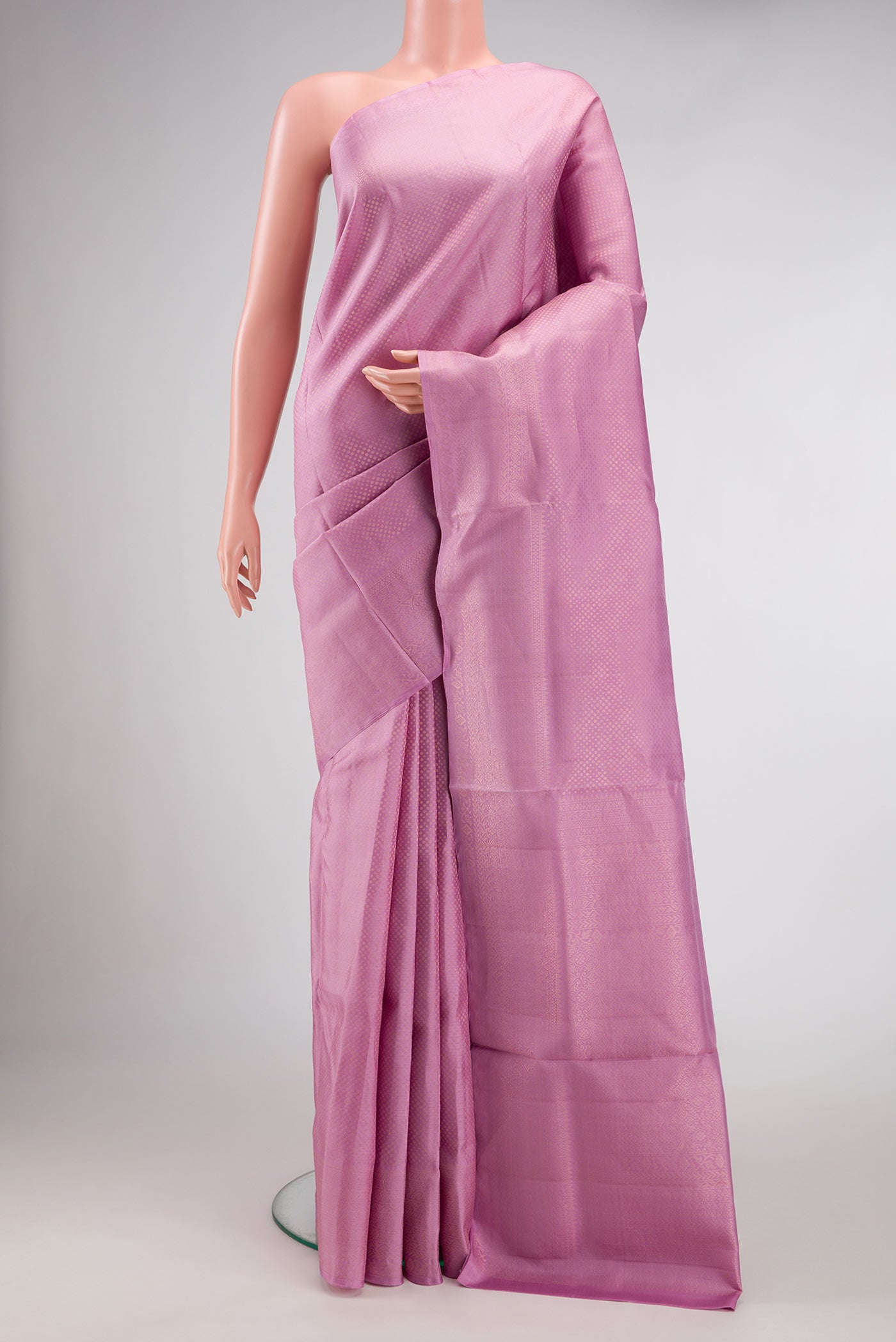 Lavender Dual Tone Soft Silk Saree with Zari Brocade on the body and Zari Border.  displayed on a mannequin