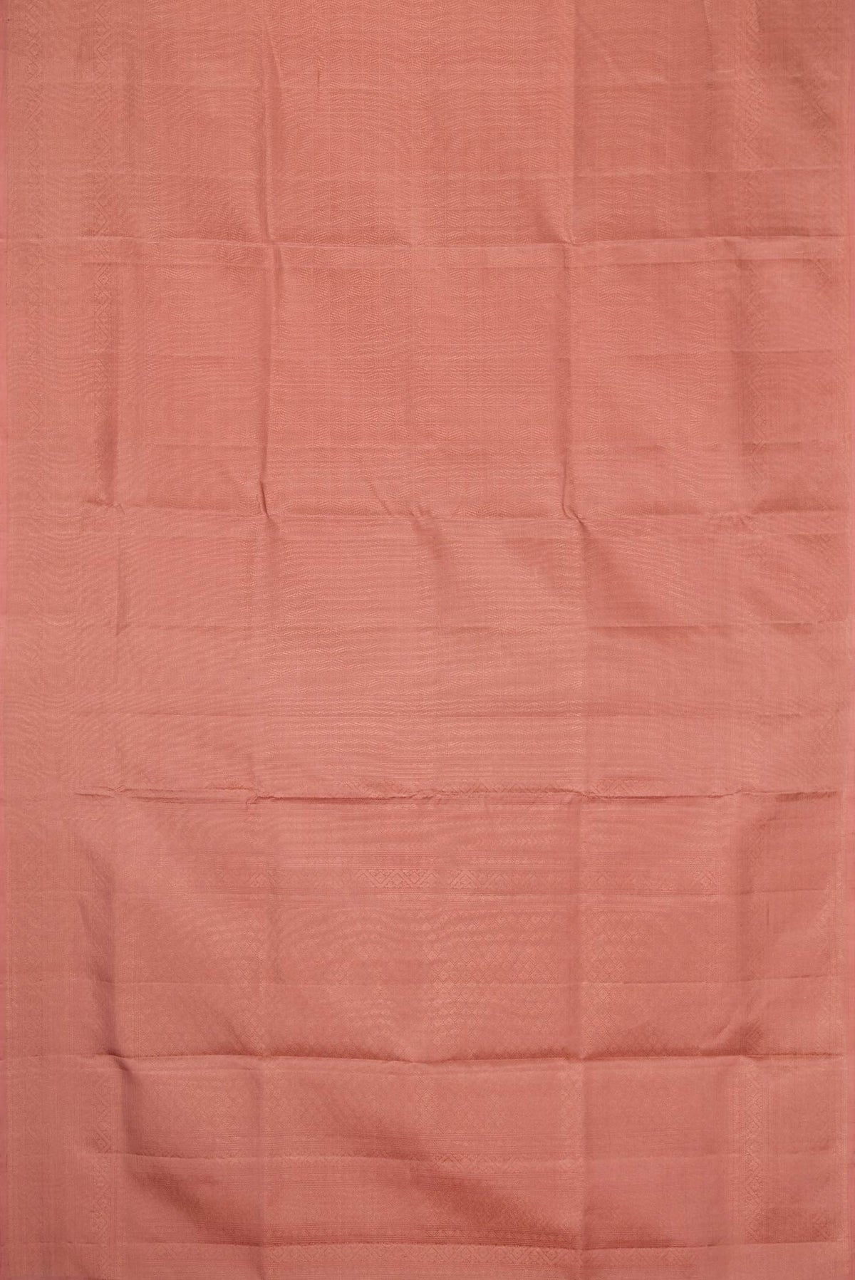 Flat view of Golden Peach Dual Tone Soft Silk Saree with Zari Brocade on the body and Zari Border. 
