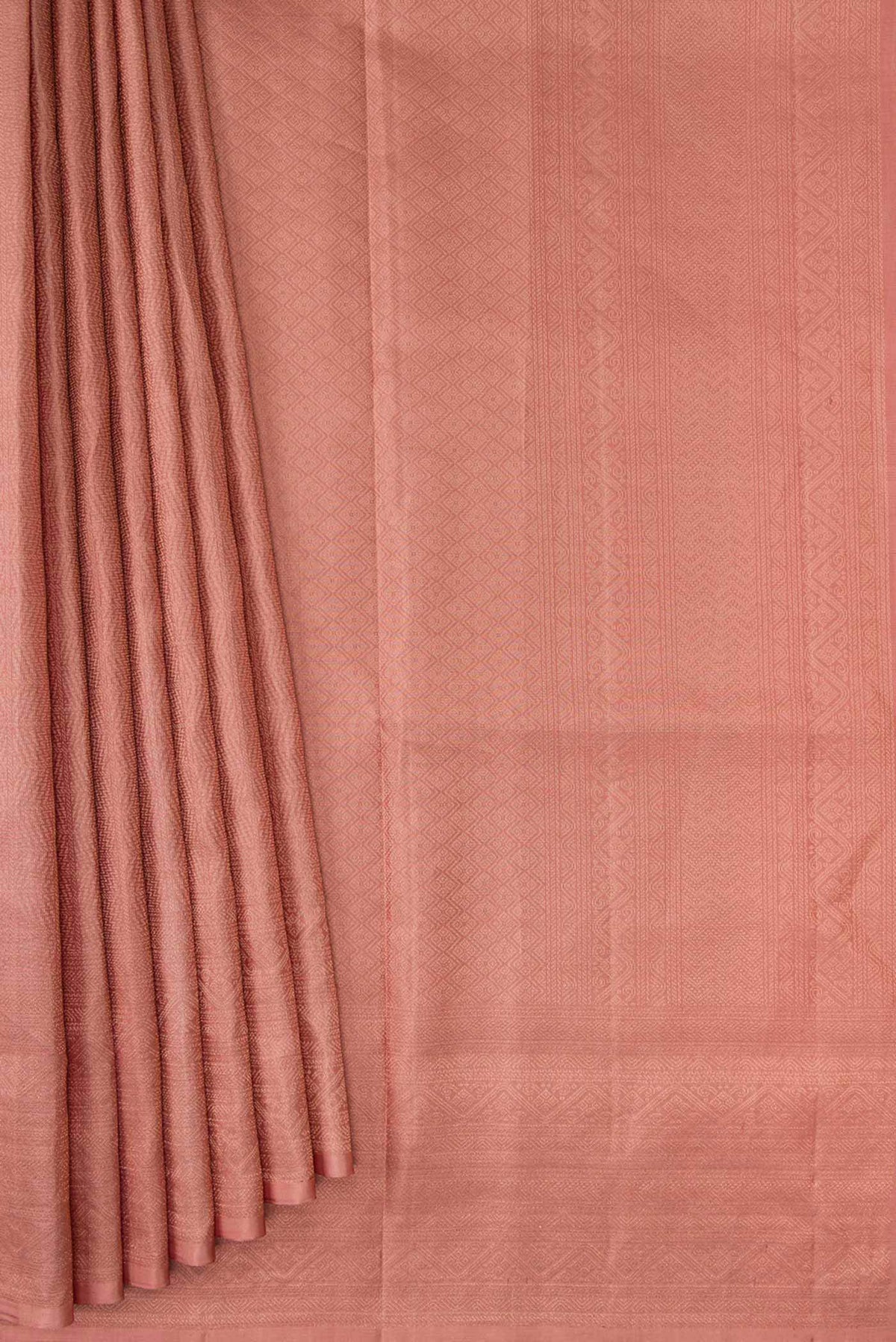Pleats and pallu of Golden Peach Dual Tone Soft Silk Saree with Zari Brocade on the body and Zari Border. 