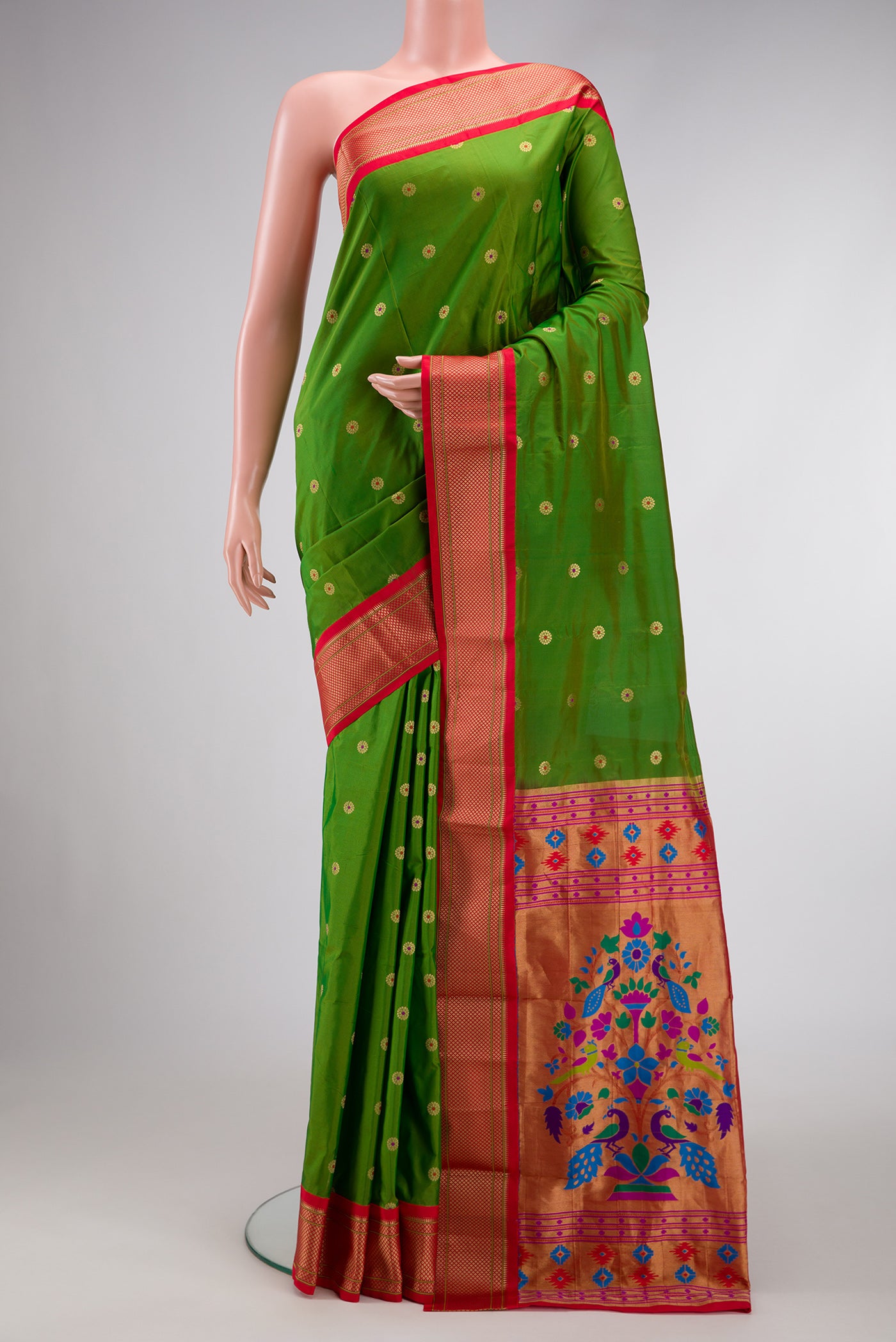 Parrot Green Dual Tone Paithani Silk Saree with Zari And Thread Butta on the body and Zari Border.  displayed on a mannequin