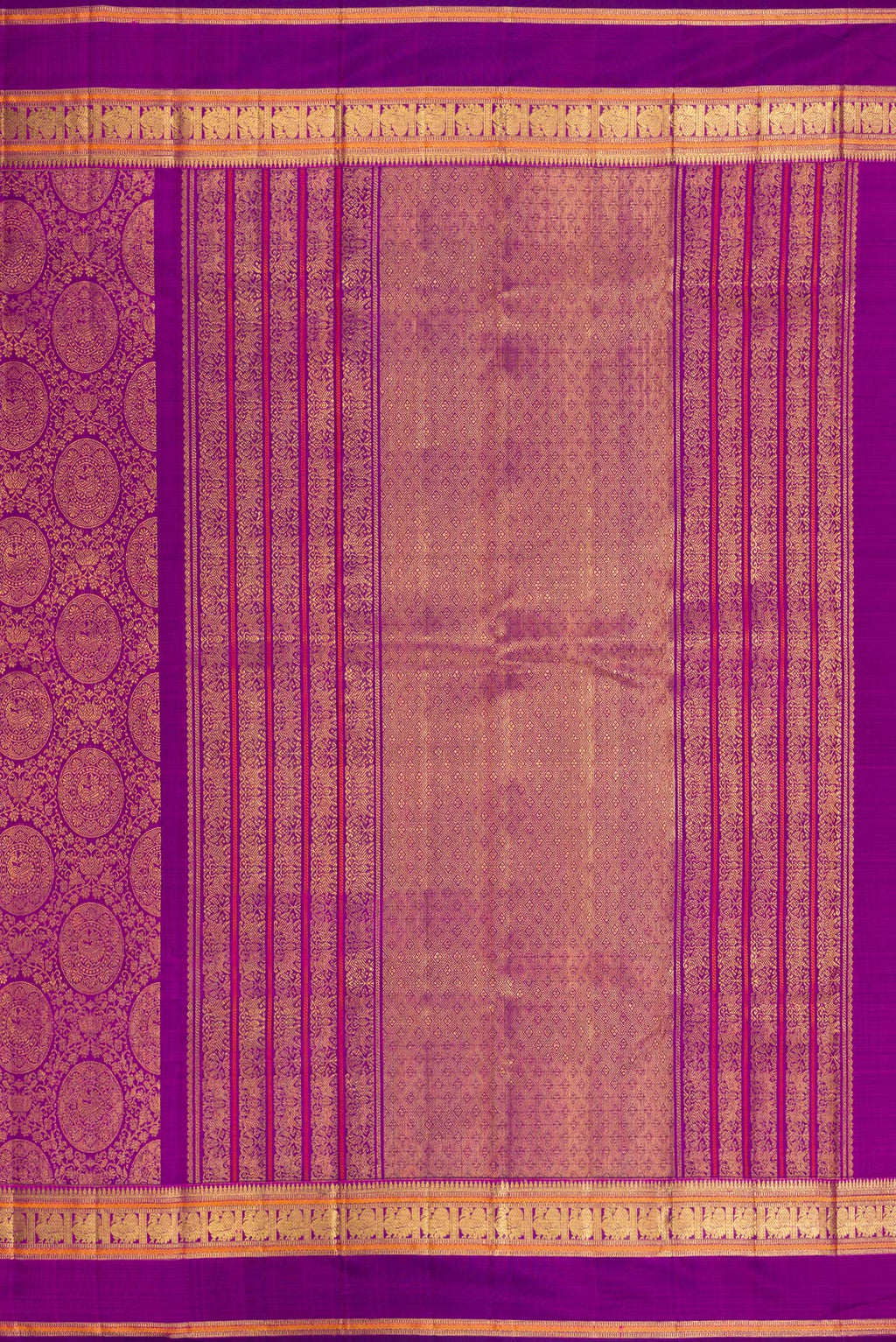 Close up image of the pallu of Purple Dual Tone Kanchipuram Silk Saree with Zari Brocade on the body and Zari Border. 