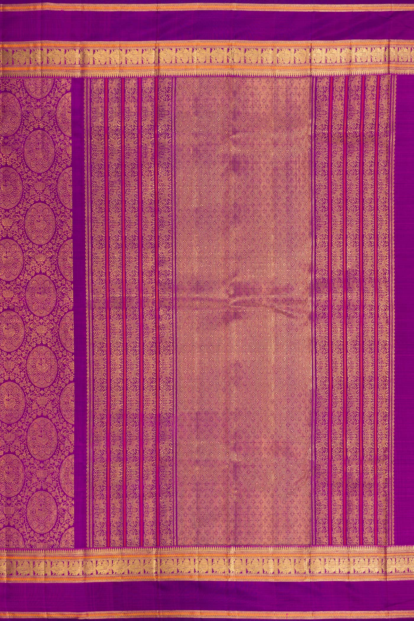 Close up image of the pallu of Purple Dual Tone Kanchipuram Silk Saree with Zari Brocade on the body and Zari Border. 