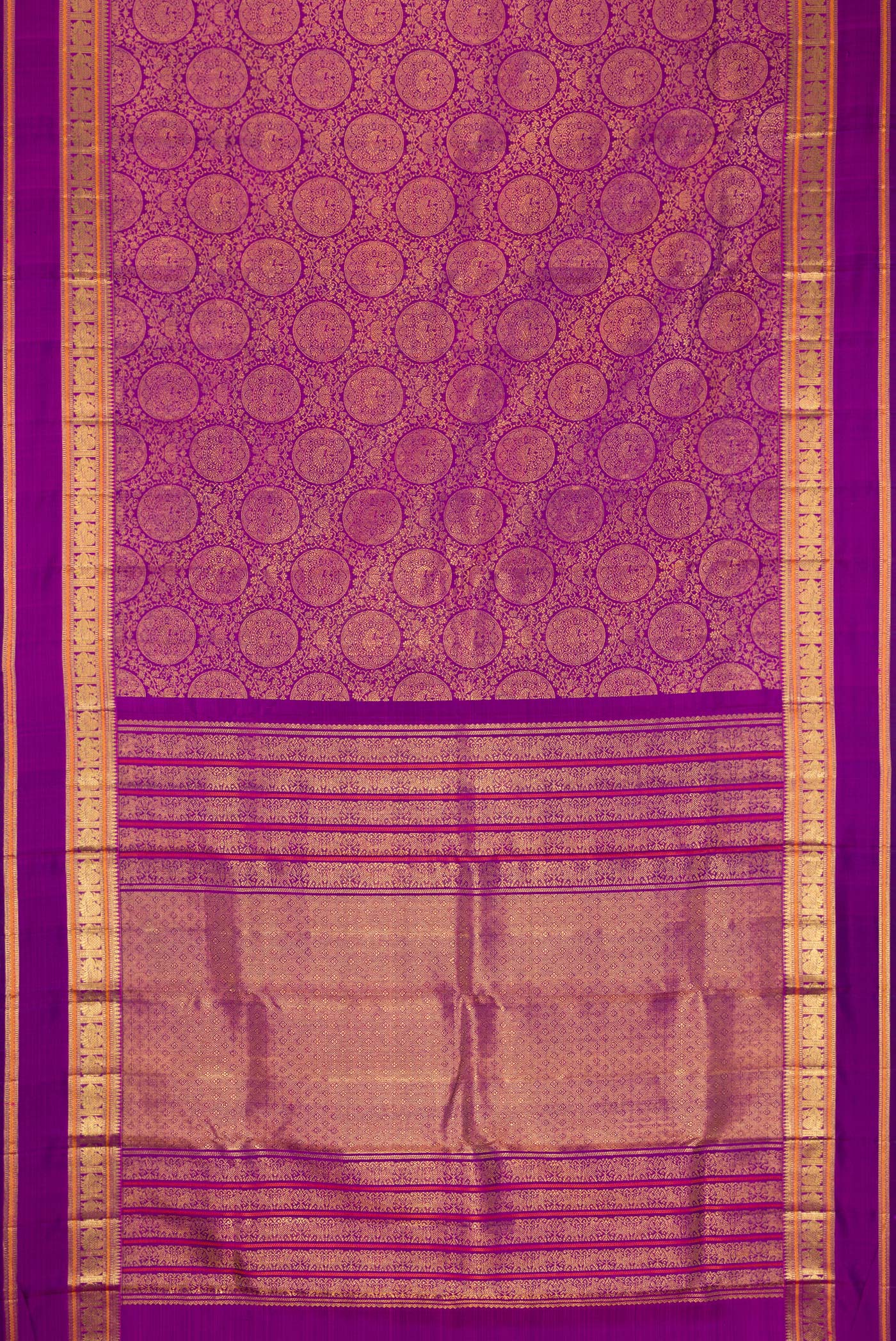 Flat view of Purple Dual Tone Kanchipuram Silk Saree with Zari Brocade on the body and Zari Border. 