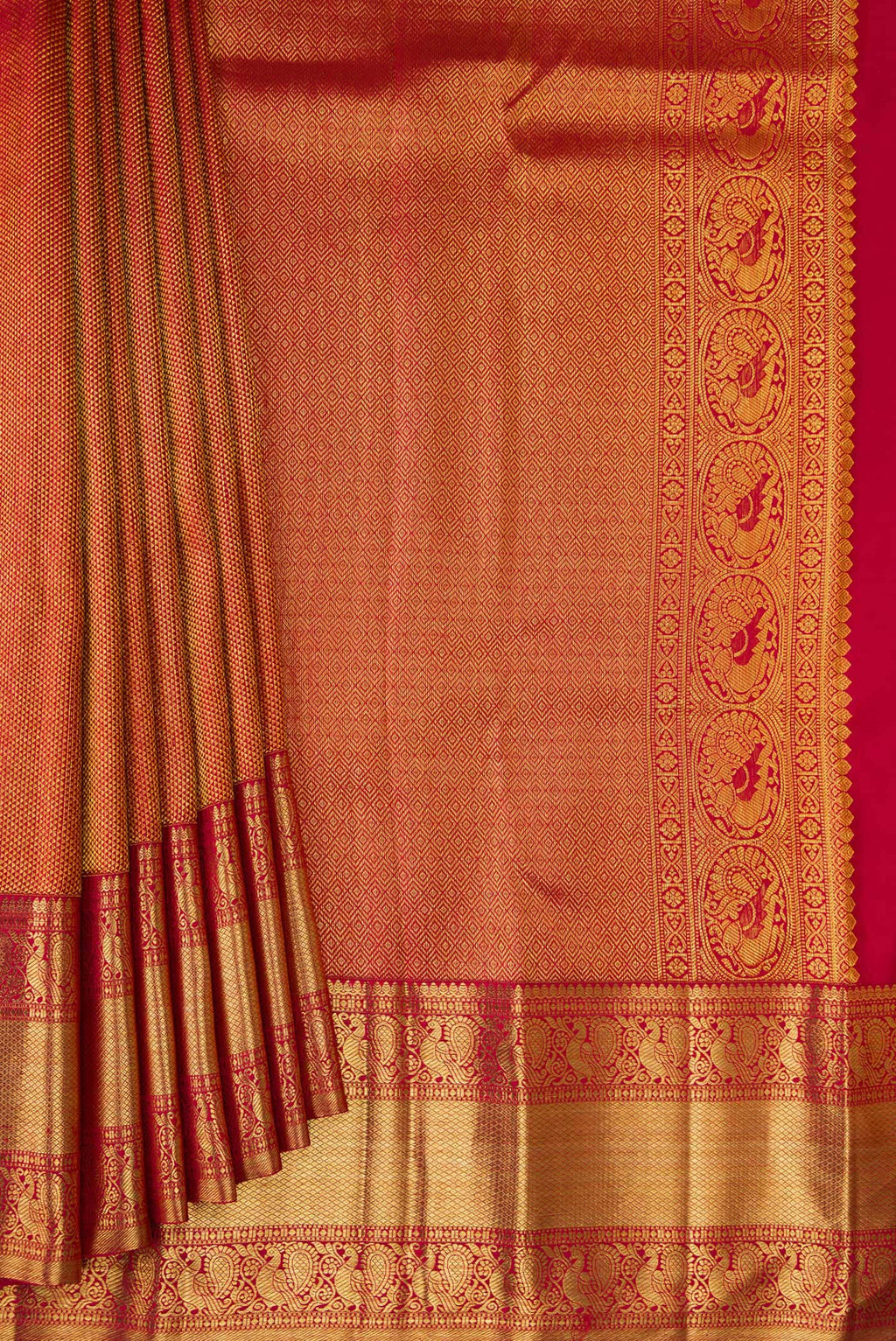 Pleats and pallu of Maroon Dual Tone Kanchipuram Silk Saree with Zari Brocade on the body and Zari Border. 