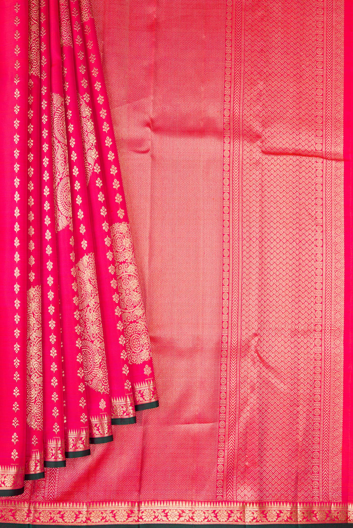 Pleats and pallu of Coral Dual Tone Kanchipuram Silk Saree with Zari Brocade on the body and Zari Border. 
