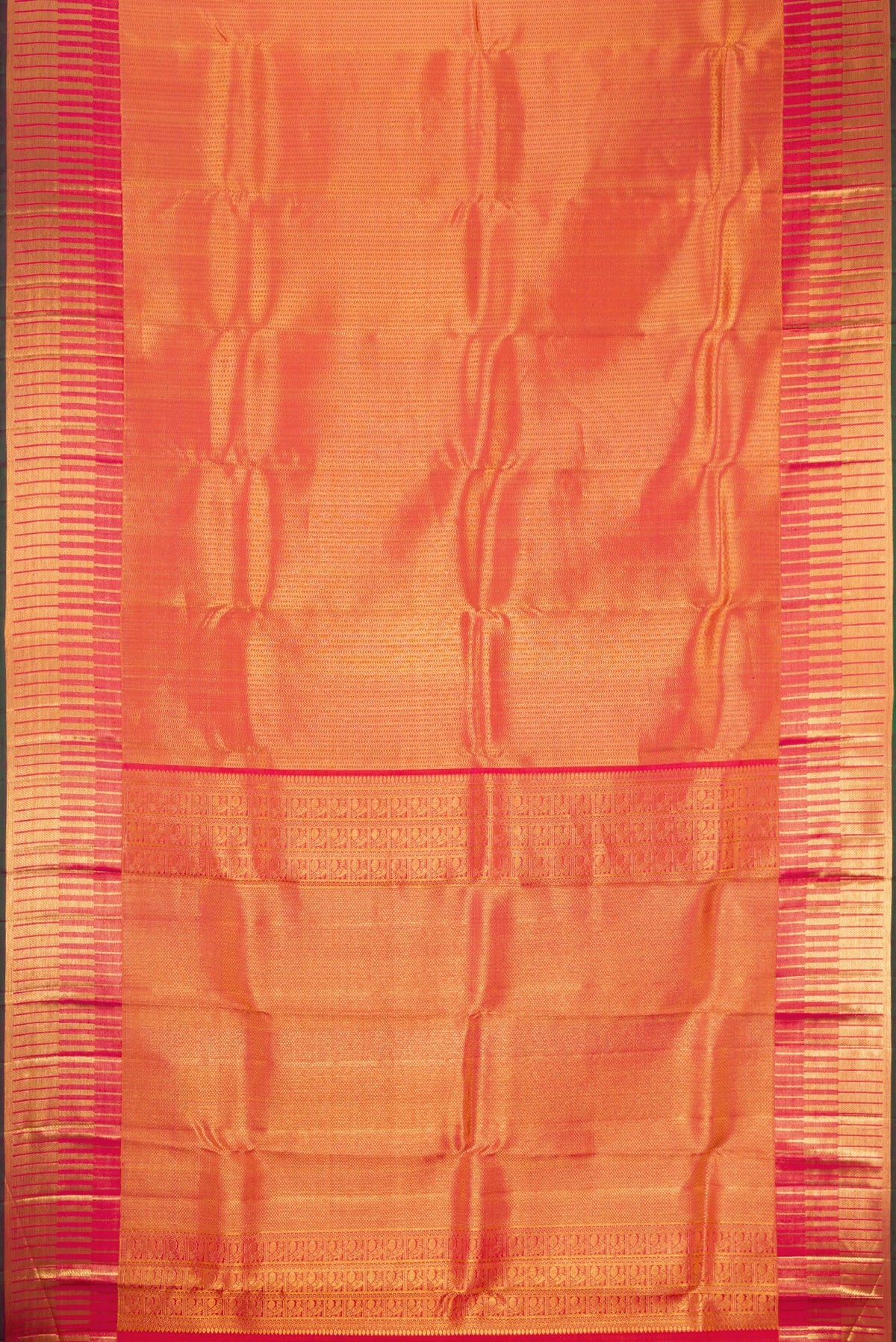 Flat view of Orange Kanchipuram Silk Saree with Zari Brocade on the body and Zari Border. 